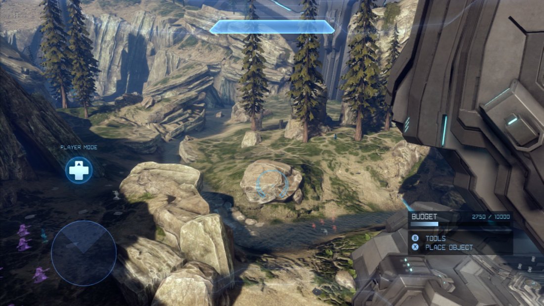 If you have ever played the map Valhalla in Halo: Reach, you will pretty much know what to expect from Ragnarok. The map is the latest re-imagining of the original Halo’s Blood Gulch. As such, it is set in a long, open valley with a a small, circular base at either end. A river running through the center of the map and the rocks on its banks block clear shots across the entire area. The Blue base backs out onto the ocean, whilst the red base sits at the base of a cliff.  Ragnarok’s [Red/Blue Bases] are identical and feature a single entrance at the back, and another two entrances facing the opposing base. Both [Bases] have an inside area and a top deck. The large rocky structure overlooking the [Creek] in the very center of the area will be called the [Top Middle].  From the front of the [Blue Base], there are several large blue rocks in front and to the left [Blue Rocks] and some trees and rocks up on the hill to the right and some large rocks behind them creating a narrow passage [Blue Woods].  Likewise, the [Red Base] features similar landmarks. From the front of the [Red base] there are rocks for cover on the left before and in the water [Red Rocks] and on the right, as with the other base, there is a raised hilly area populated by trees [Red Woods].  The top decks from both [Bases] feature a pair of man cannons. The one aimed towards the center of the map at both [Bases] will have players land just short of the [Top Middle]. The side-ways facing cannons will deposit players in one either the [Blue Woods] area or the [Red Rocks] depending on on the team’s side of the map.  About half way between the two [Bases] on opposing sides of the map, players will find a [Crashed Pelican] and a large [Wall]. Between these on the [Crashed Pelican] side of the [Creek] players will find the [Top Middle] and on the [Wall] side is a lower rocky structure set up with a [Turret].  Along with several rock placements throughout the center of the map, the [Crashed Pelican] is a favourite hangout spot for snipers and to either side of it are large rocks creating narrow passages [Red Den] and [Blue Den] for relatively safe passage to either base.  The tactically important areas are: [Red Base], [Blue Base], [Creek], [Top Middle], [Blue rocks], [Red rocks], [Blue woods], [Red Woods], [Crashed Pelican], [Turret], [Wall], [Red Den] and [Blue Den].