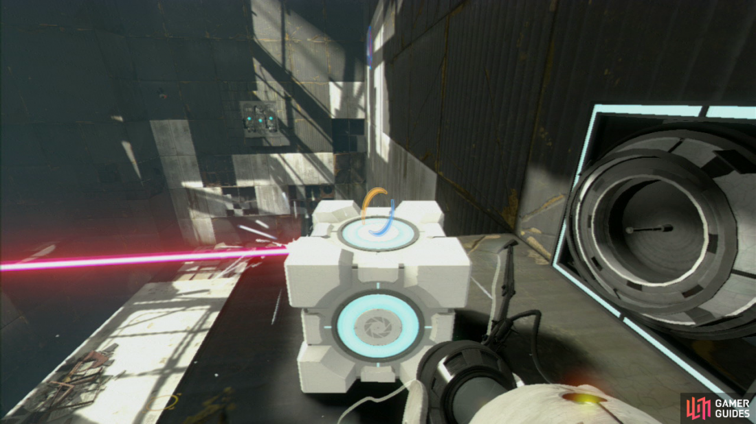 Once you’re back on the main floor, stand on the jump pad and you’ll hit the glass wall on the middle level. Place your Companion Cube in front of the laser to break it, dropping the barrier behind you.