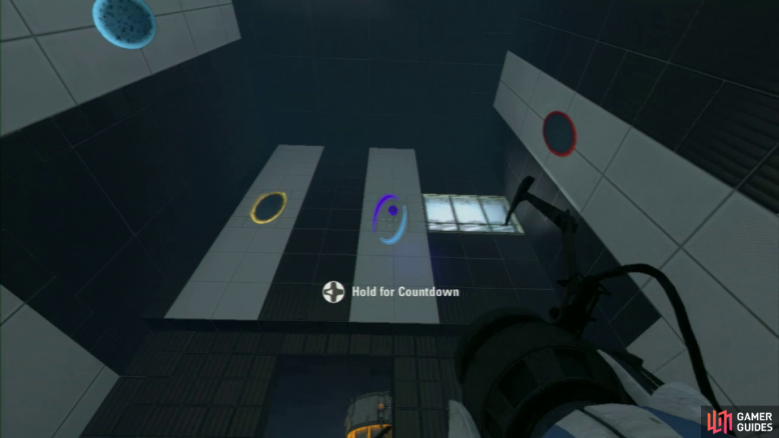 Player 1: Once you enter the room, you should notice the two red buttons up on the wall straight ahead of you. There are also two Arial Faith Plates located on the ground on both the left and right-hand side of the room. Your first task is to plant a portal on the blue ‘target’ on one of the walls, and then place an exit portal (at the same height) on the wall above the entrance to the room.