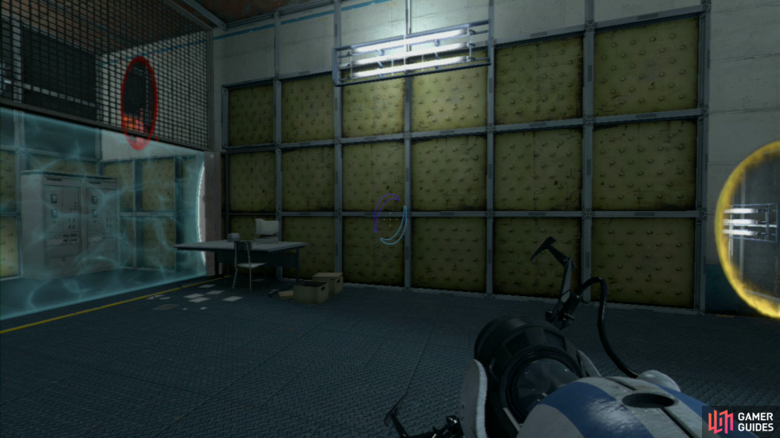 Player 2: Upon entering the building set your first portal on the wall directly beside the ‘override’ beam and then fire at the top of the wall through the metal grating (where player 1 will currently be). Step through the portal, grab the ball from player 1 and set it in the override slot to open up the path to part 2.