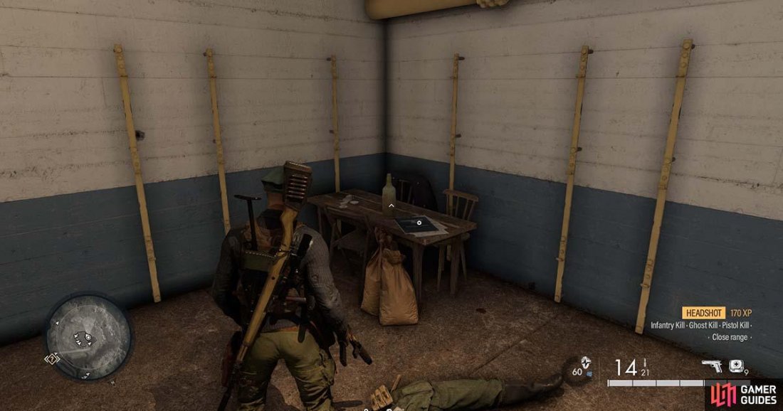 The document can be found on this table inside the bunker.