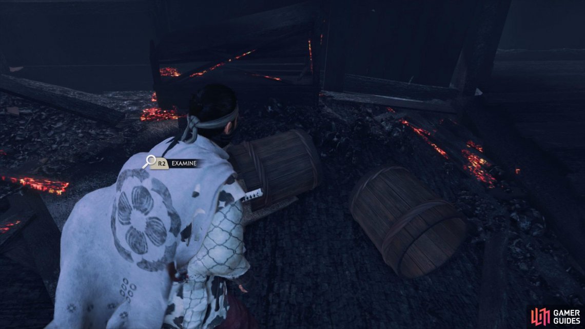 Examine the Barrels and Corpse inside the burnt down building