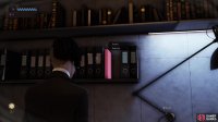 Snatch the pink file on the shelves to the left of Jara Drorys computer