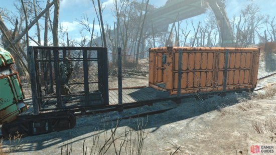 Follow some railroad tracks to find a caged suit of Power Armor.
