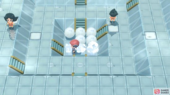 To reach the Gym Leader, you need to slide into the snowballs from higher ground.