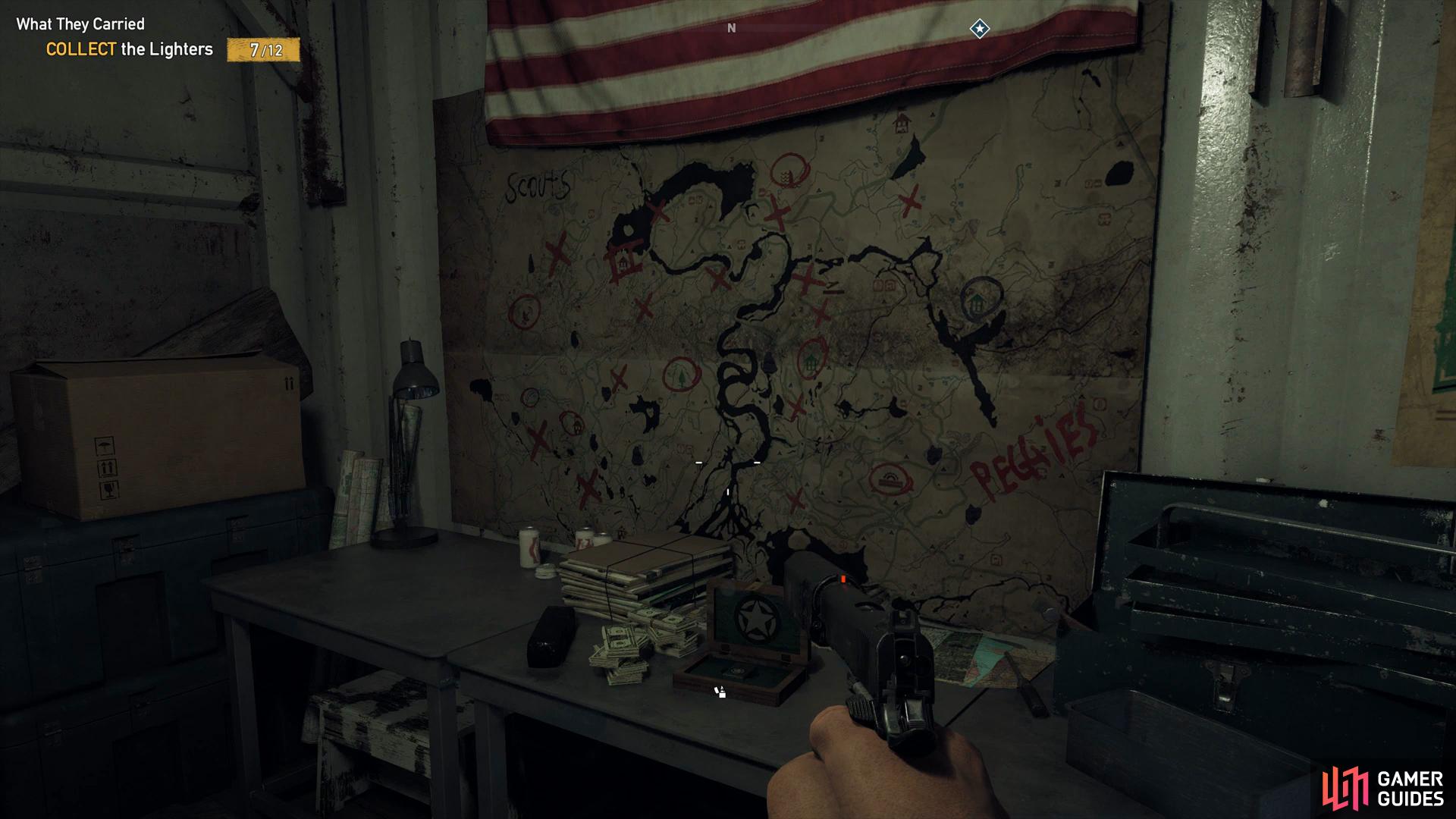 the Lighter is sitting in front of the map of Hope County at the bottom of the bunker.