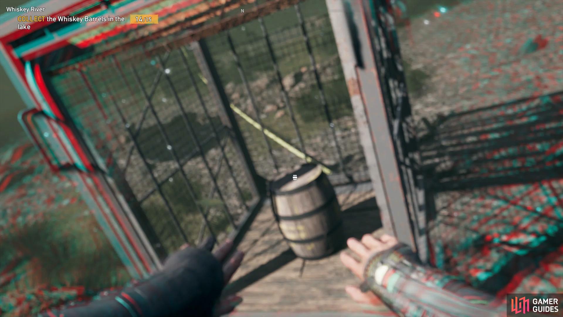 stand on the nearby rocks to shoot the cage open and collect the barrel.