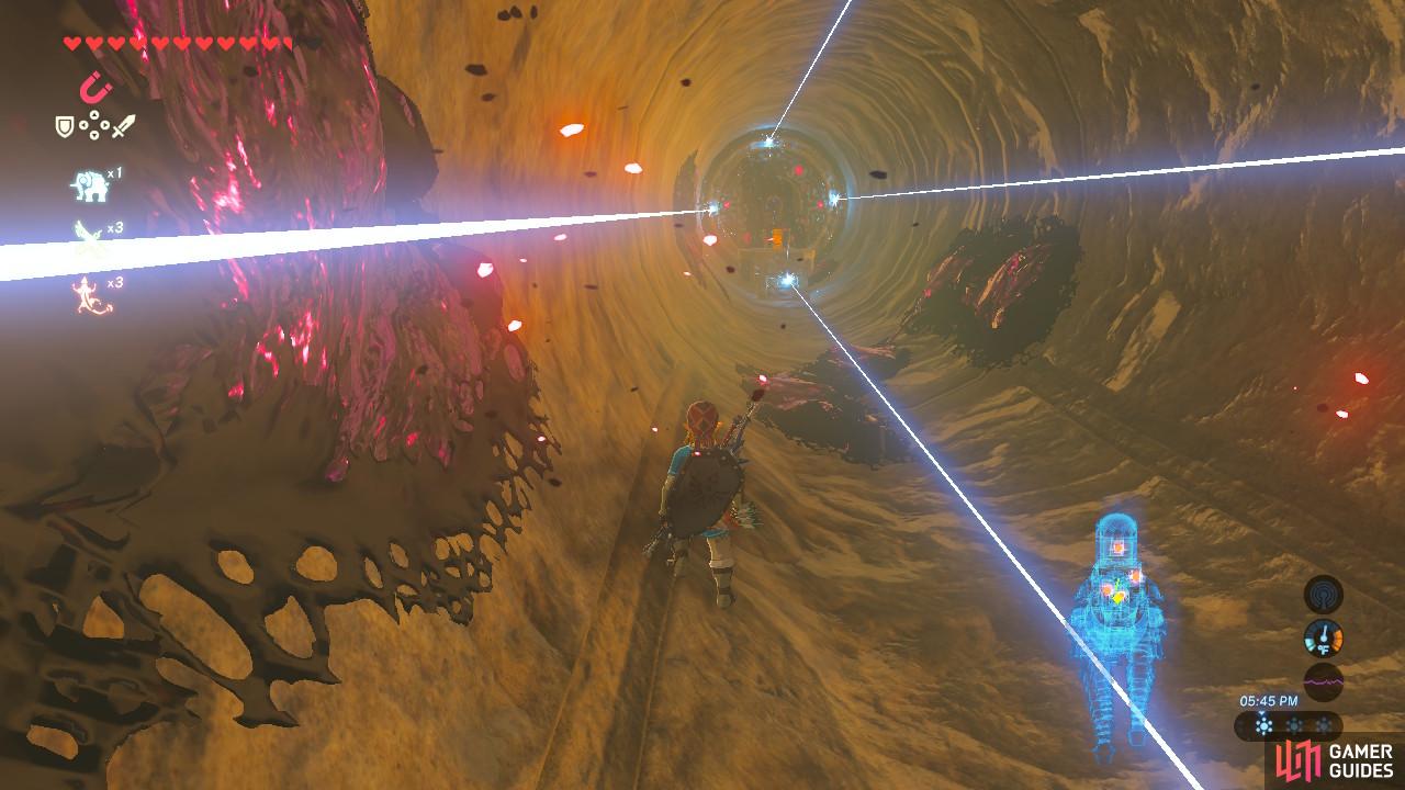 Run between the lasers as fast as you can so you don't get stuck and hit