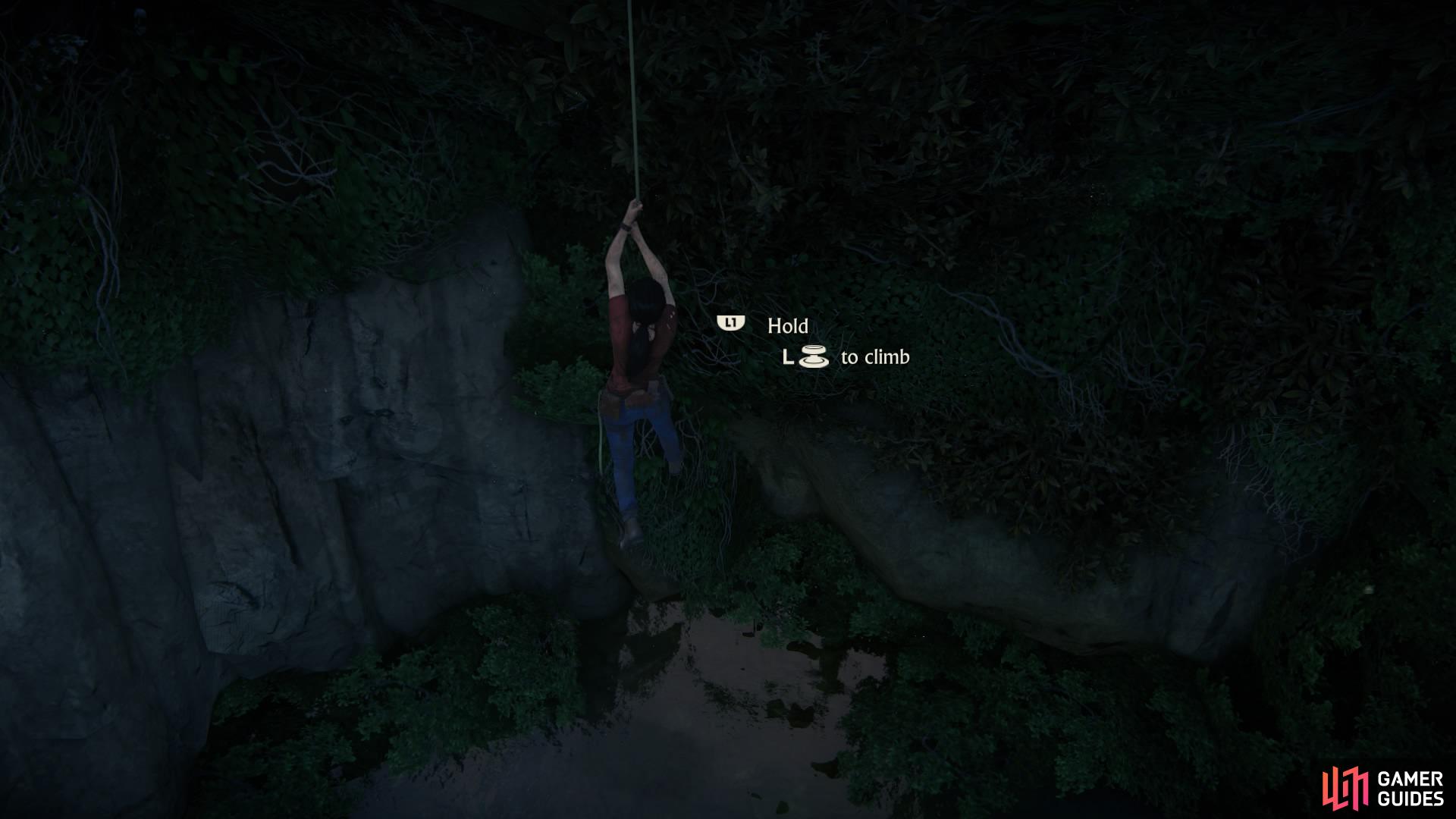 Climb the rope while hanging using L1 and the left analogue stick on the controller