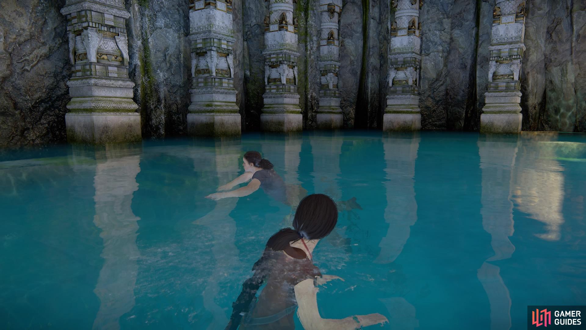 Swim along the pillars on the left side