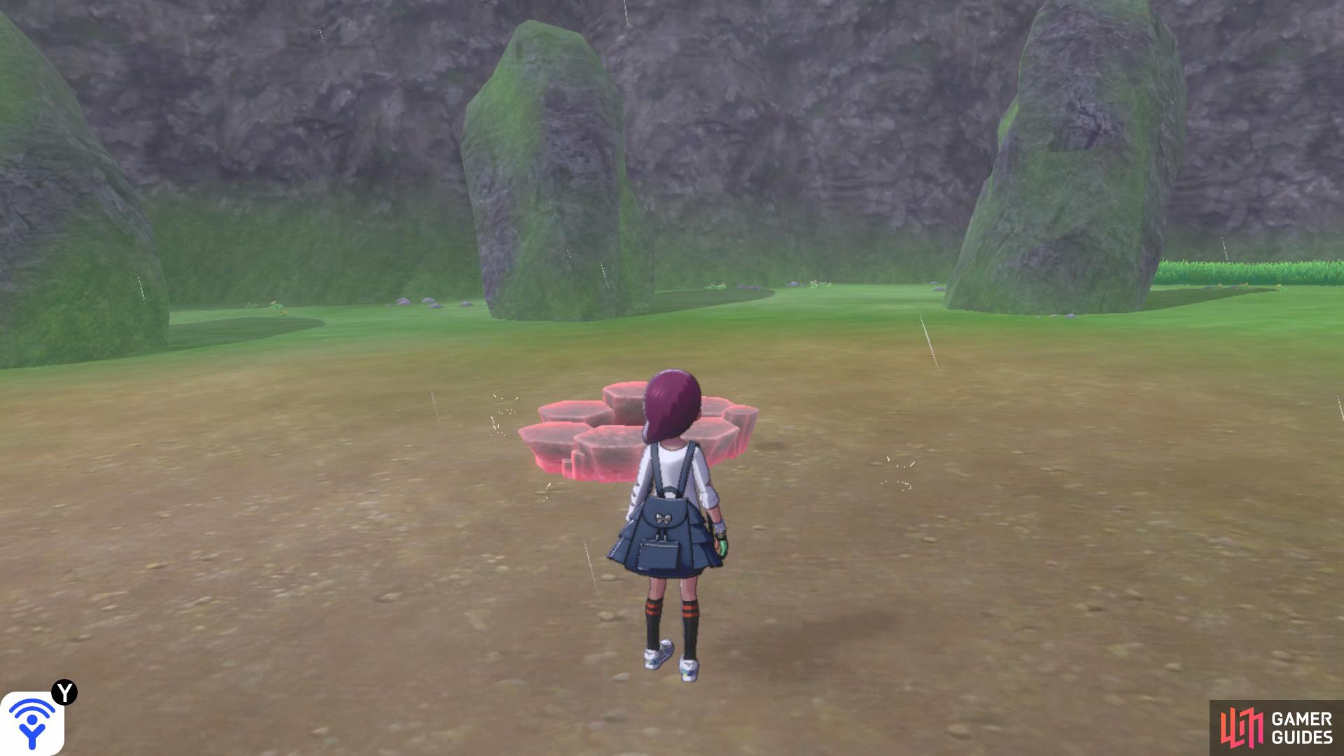 You'll find Den B in the middle of the stone circle.