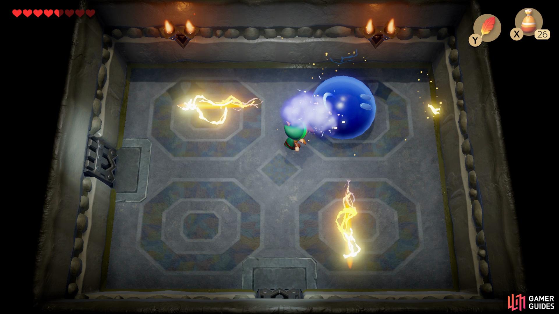 In order to take out the Giant Buzz Blob you'll need to sprinkle it with Magic Powder to turn it blue allowing you to deal damage,
