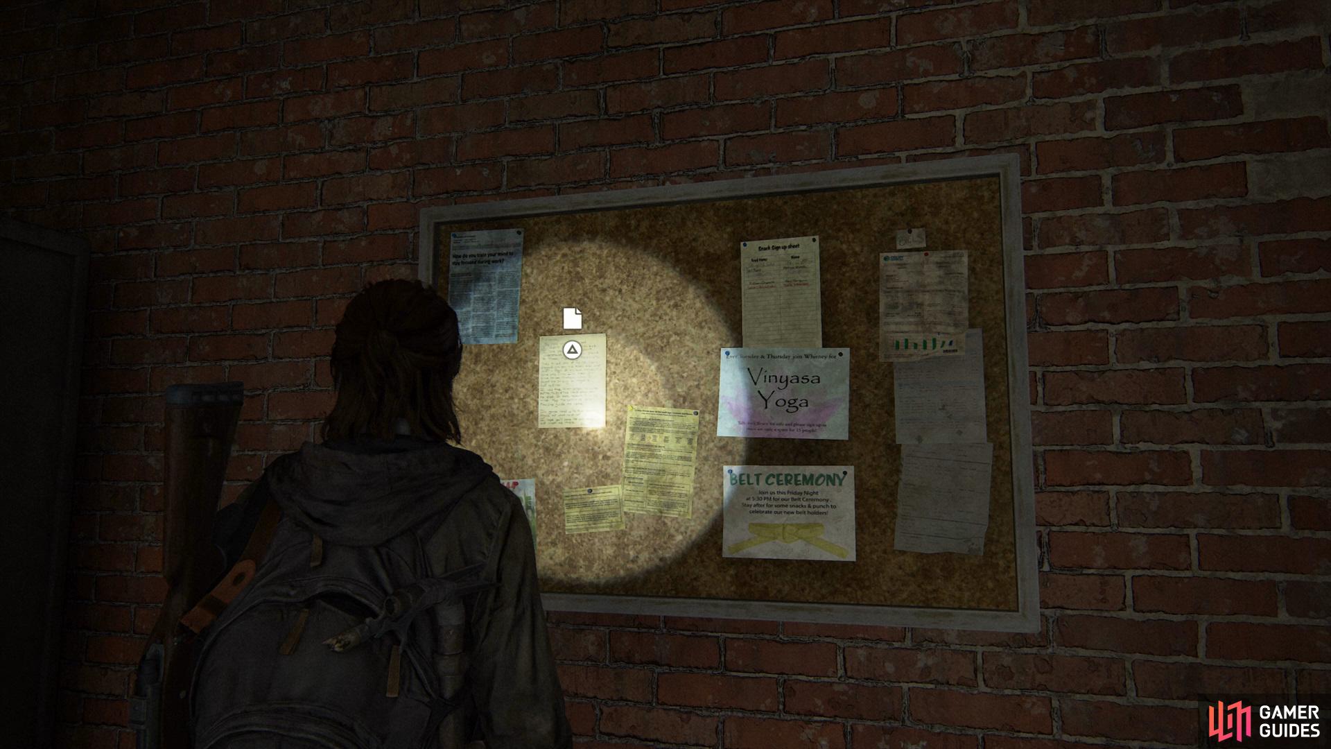 Once you reach an area full of bodies, head into the building on the right to find an Artefact pinned to the noticeboard