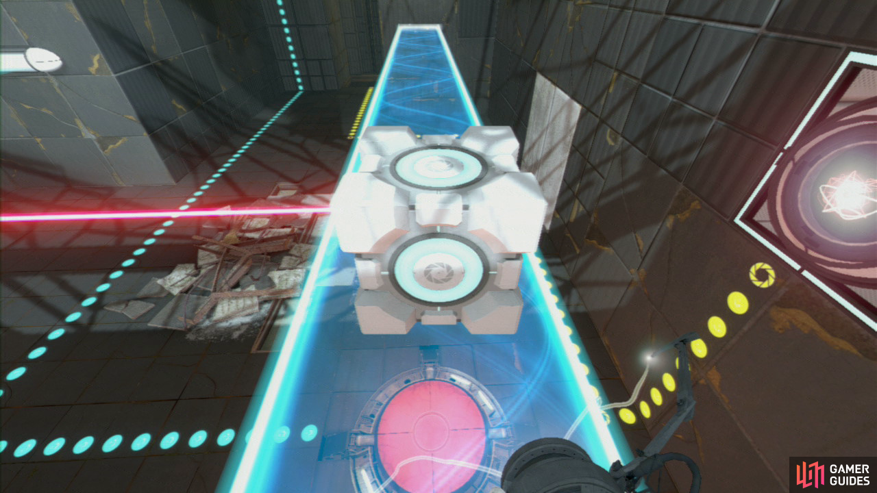 Take the Cube back through the portal behind you and set it down in front of the laser (so it's also directly above the red button below). This will cause the elevator up ahead to descend.