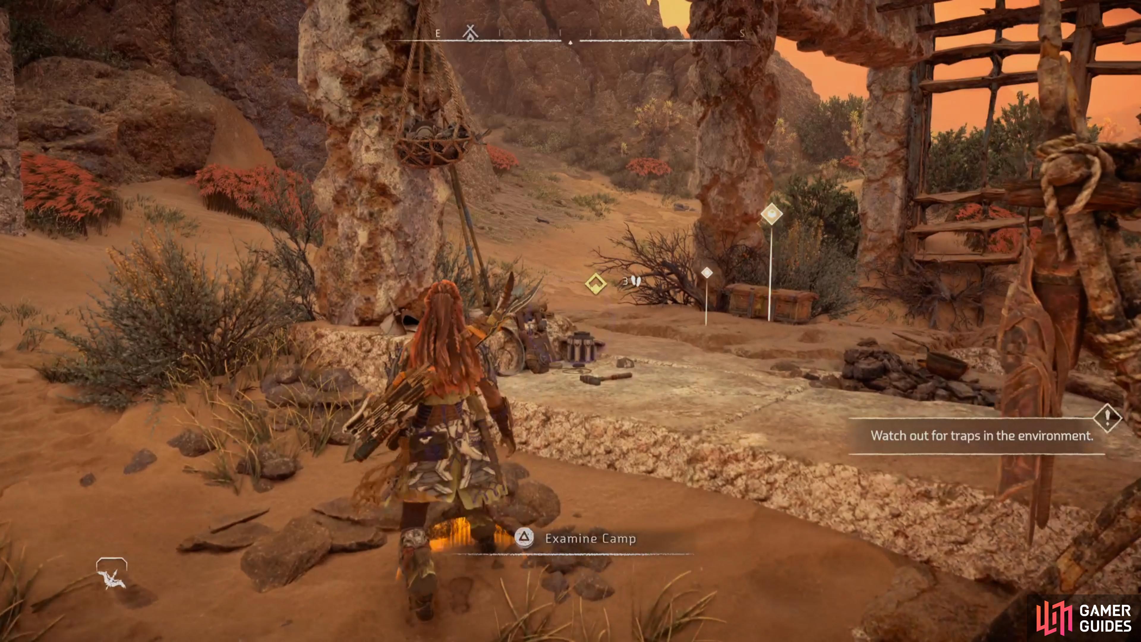 After you've defeated them, examine the camp at the back of the area.