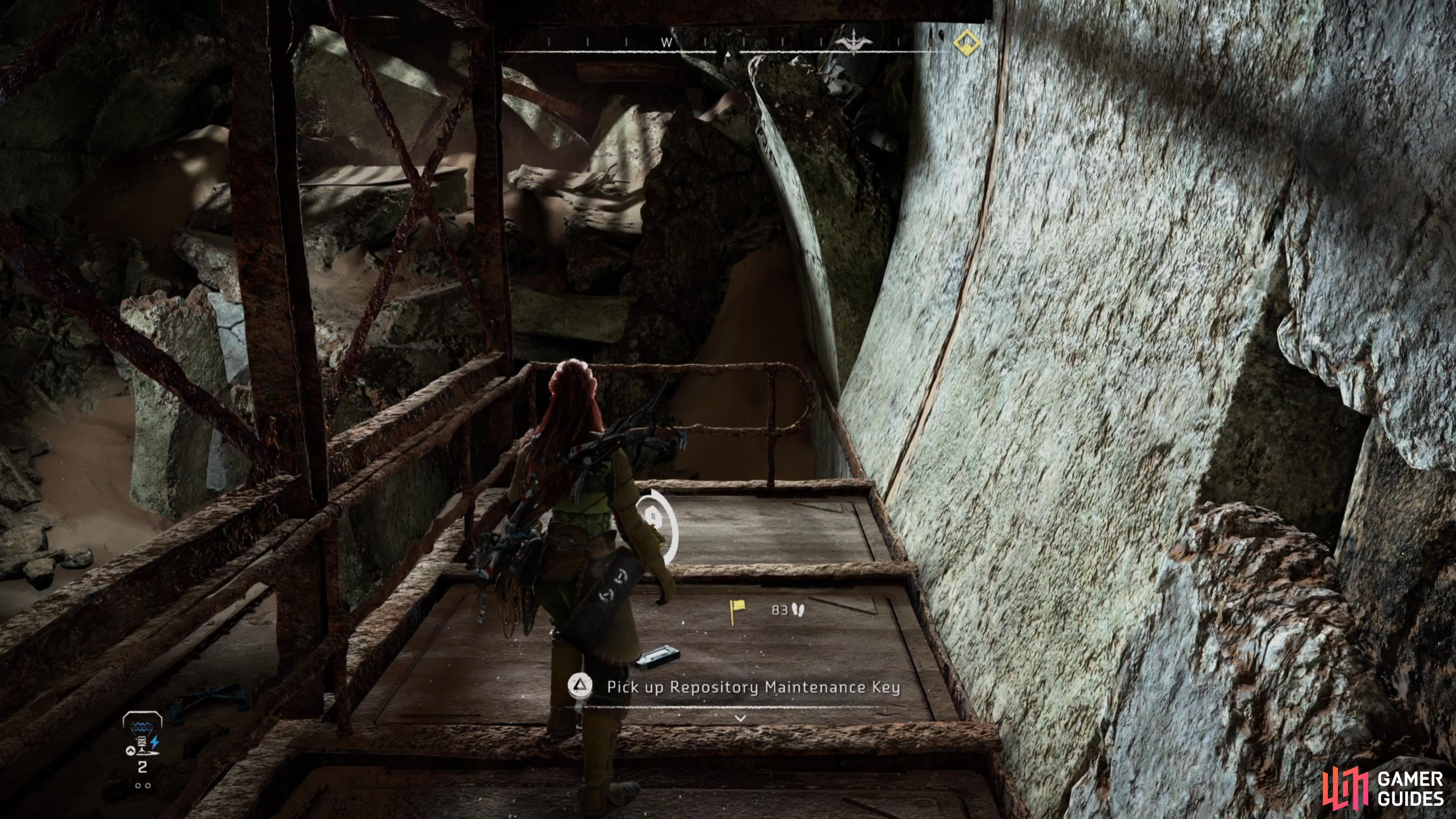 Climb up to the platform and collect the Repository Maintenance Key.