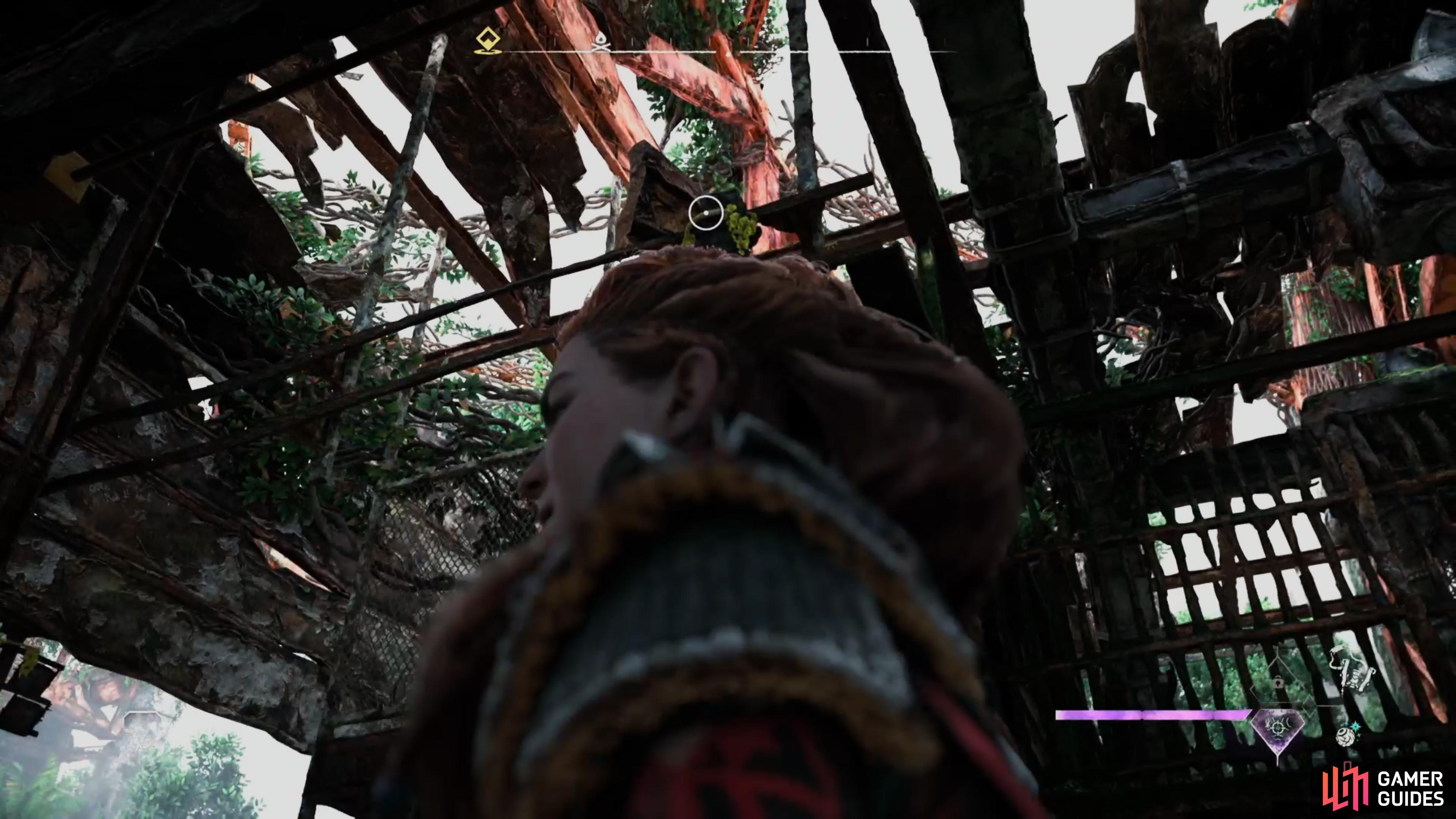 then quickly go up onto the grapple point and jump on the upper platform.