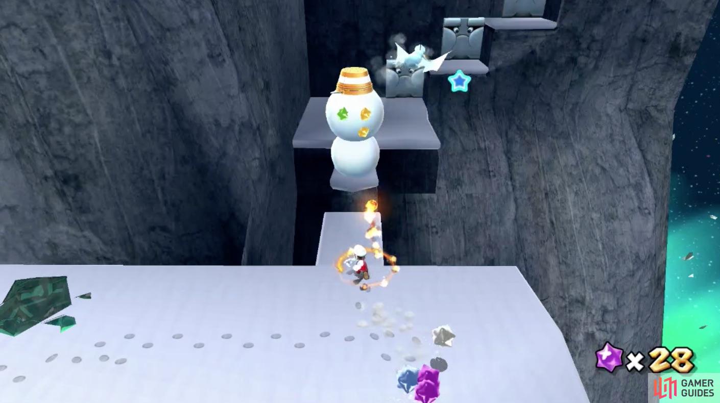 Use Fire Mario's fireballs to get rid of the snowmen.