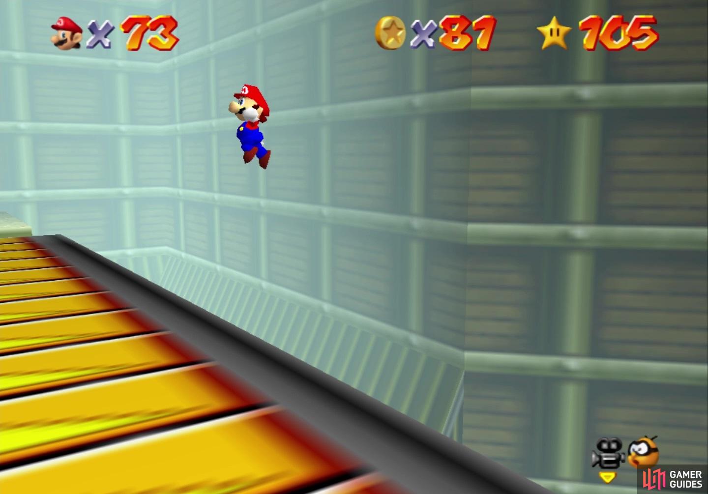 With time still, you will have to Triple Jump and Wall Jump to reach the conveyor