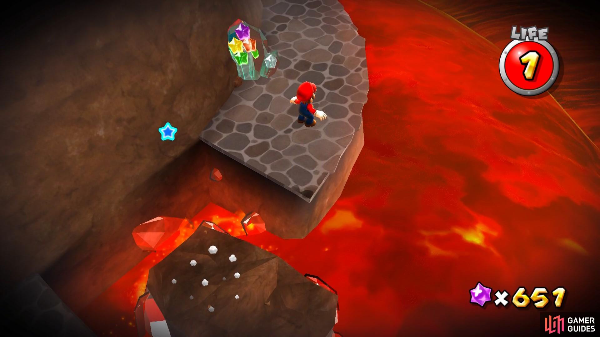 Make your way up the sinking spire and watch out for lava and boulders!