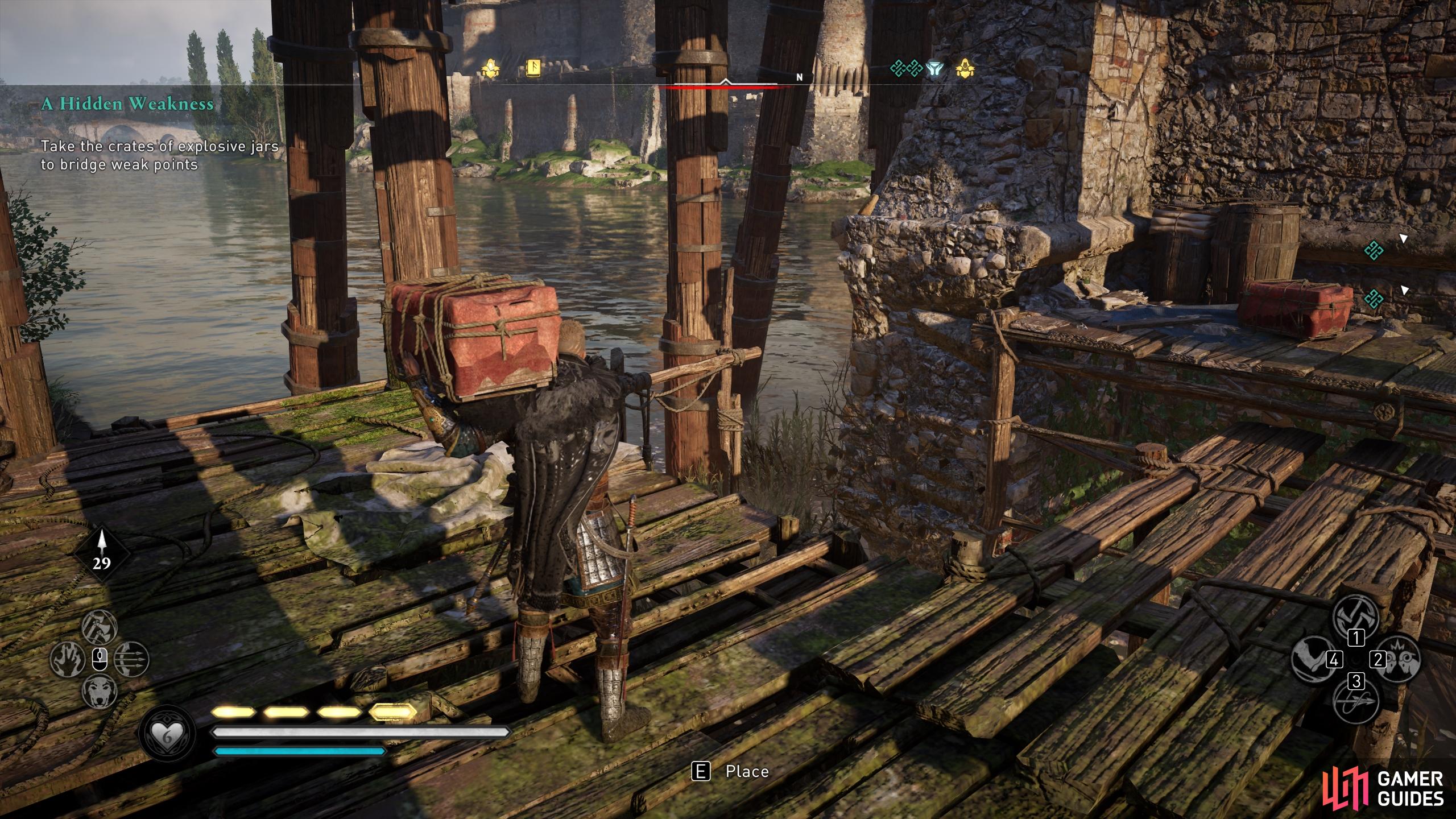 Carry the second crate along the wooden planks on the left side of the bridge.