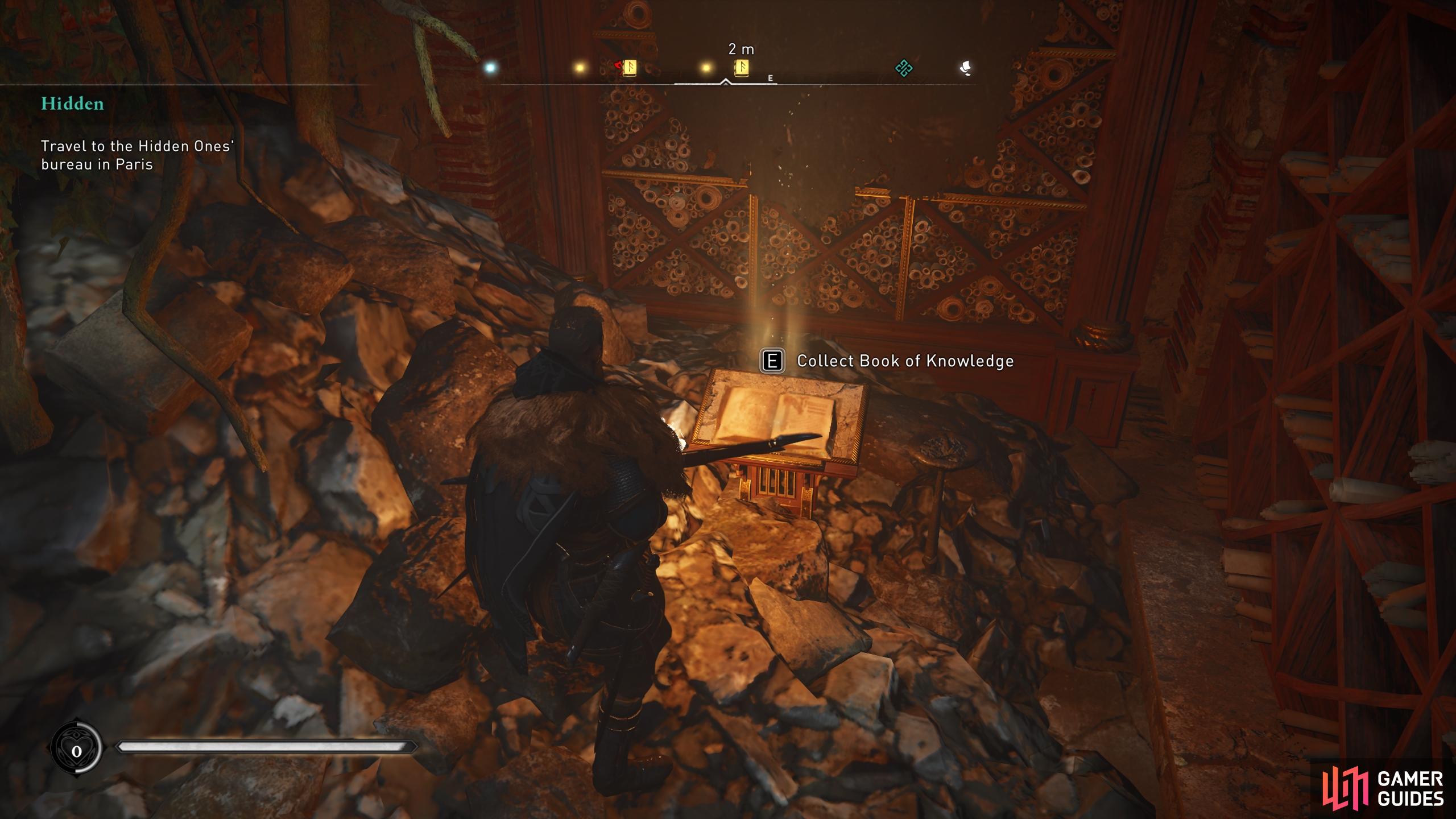 You'll find the Book of Knowledge behind the barricade beyond the northern wall.