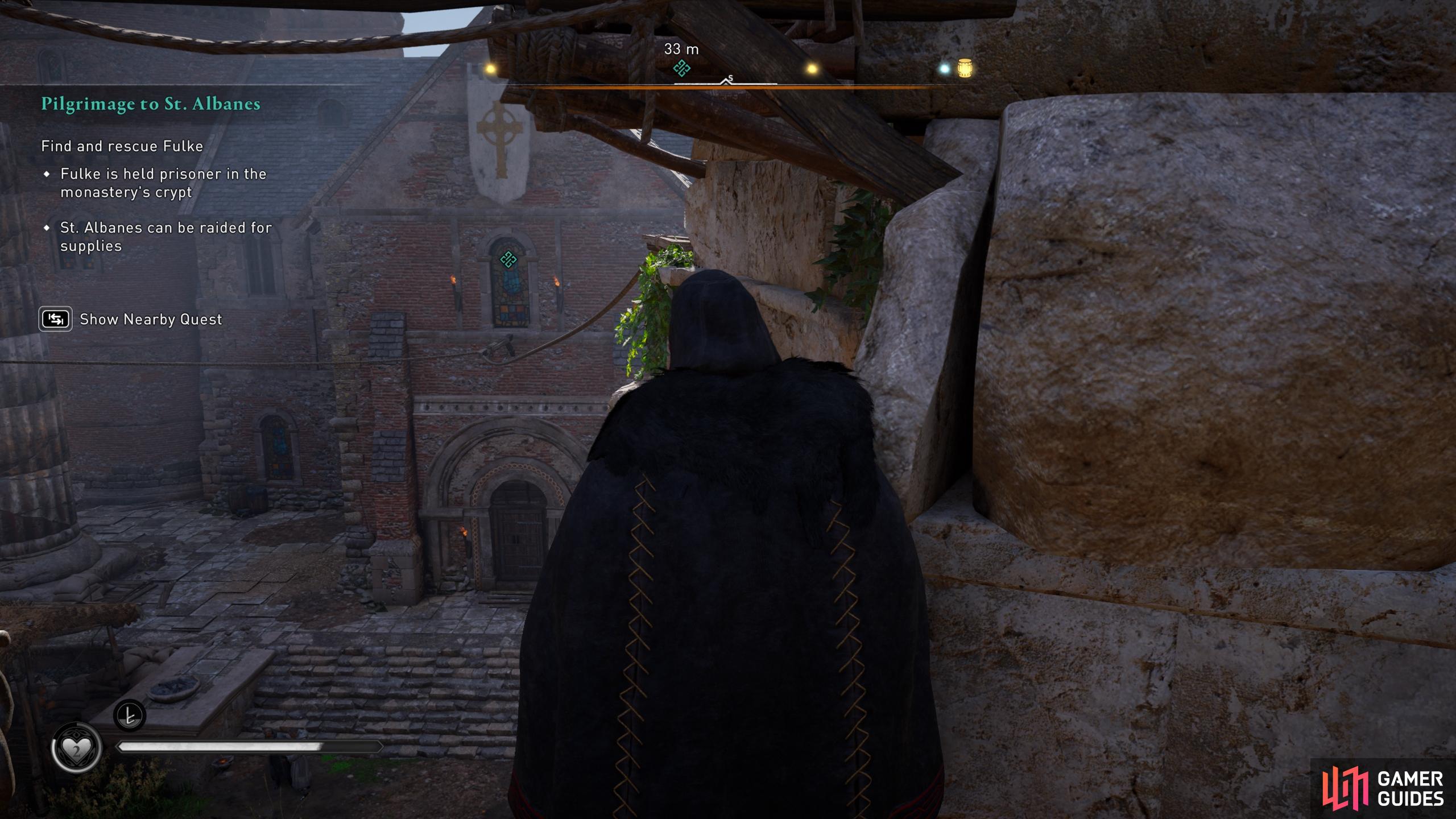 You can shoot the window above the main door of the monastery to enter undetected.