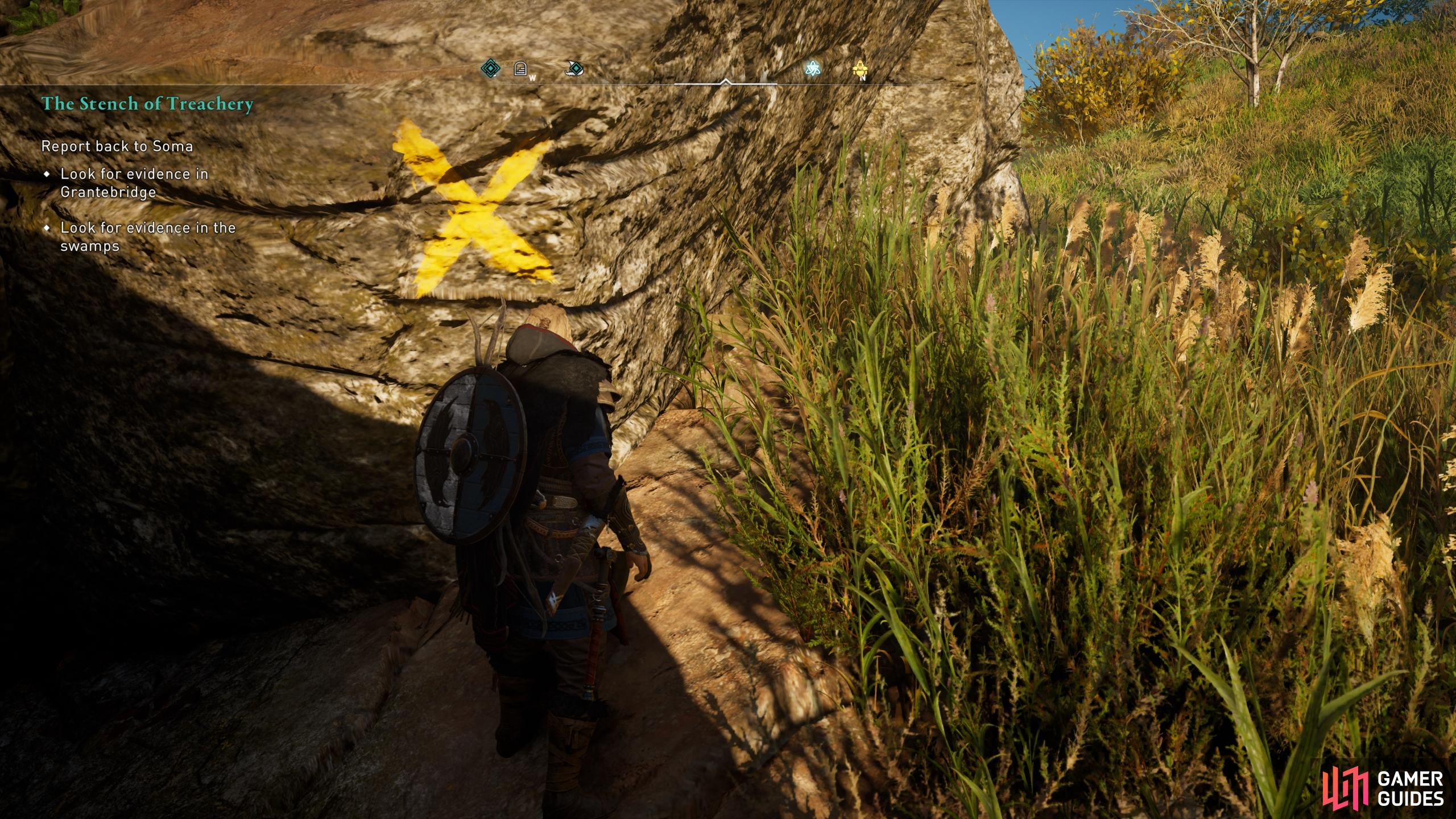 At the end of the tunnel system you will find a yellow paint marking on the rock face.