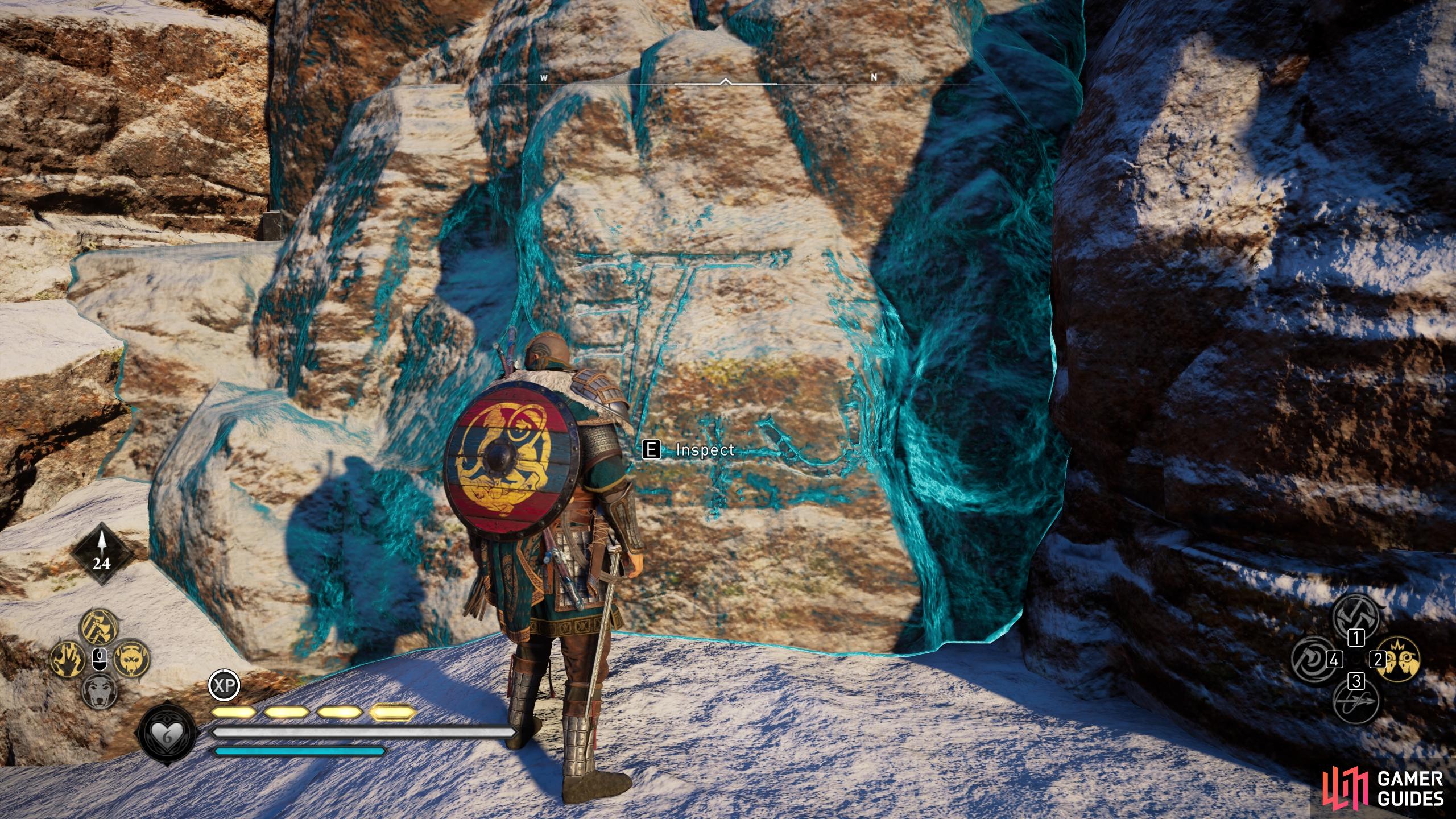 You can use Odin's Sight to highlight the runic inscription, then interact with it to reveal the entrance.