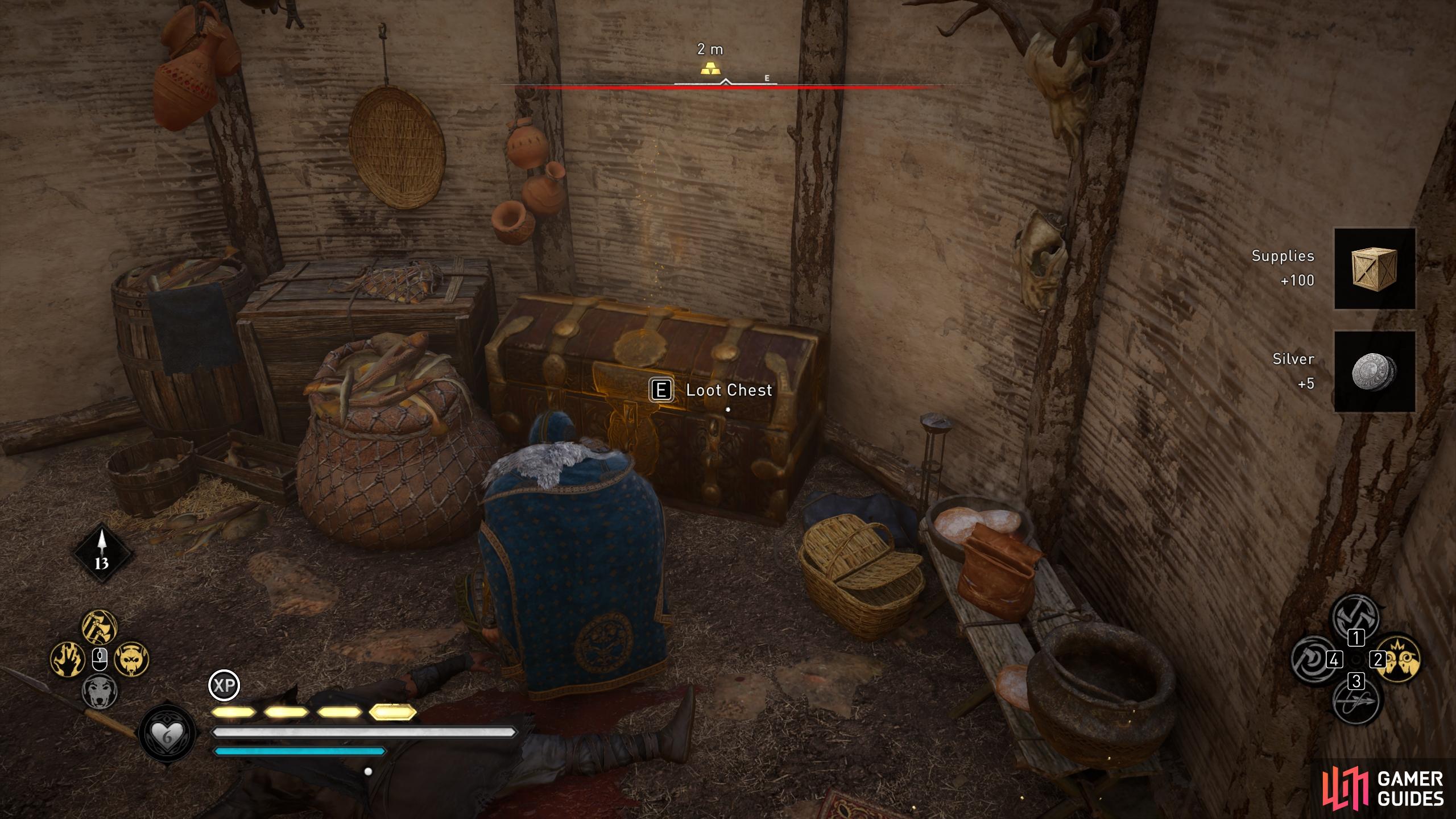 The chest can be found in a roundhouse within the camp.