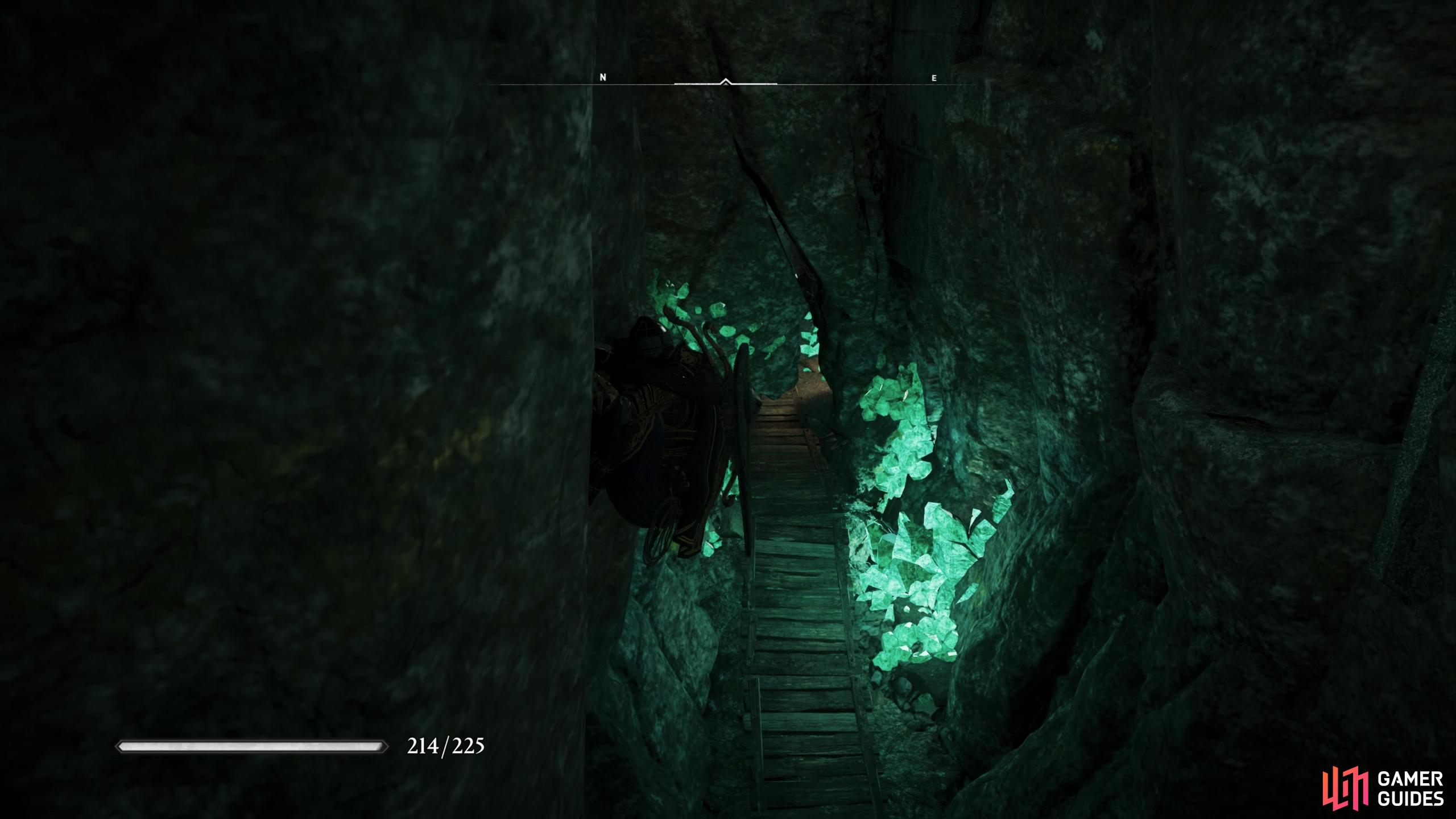 You'll need to look for this crack in the northeast wall to access the area where the merchant Dar resides.