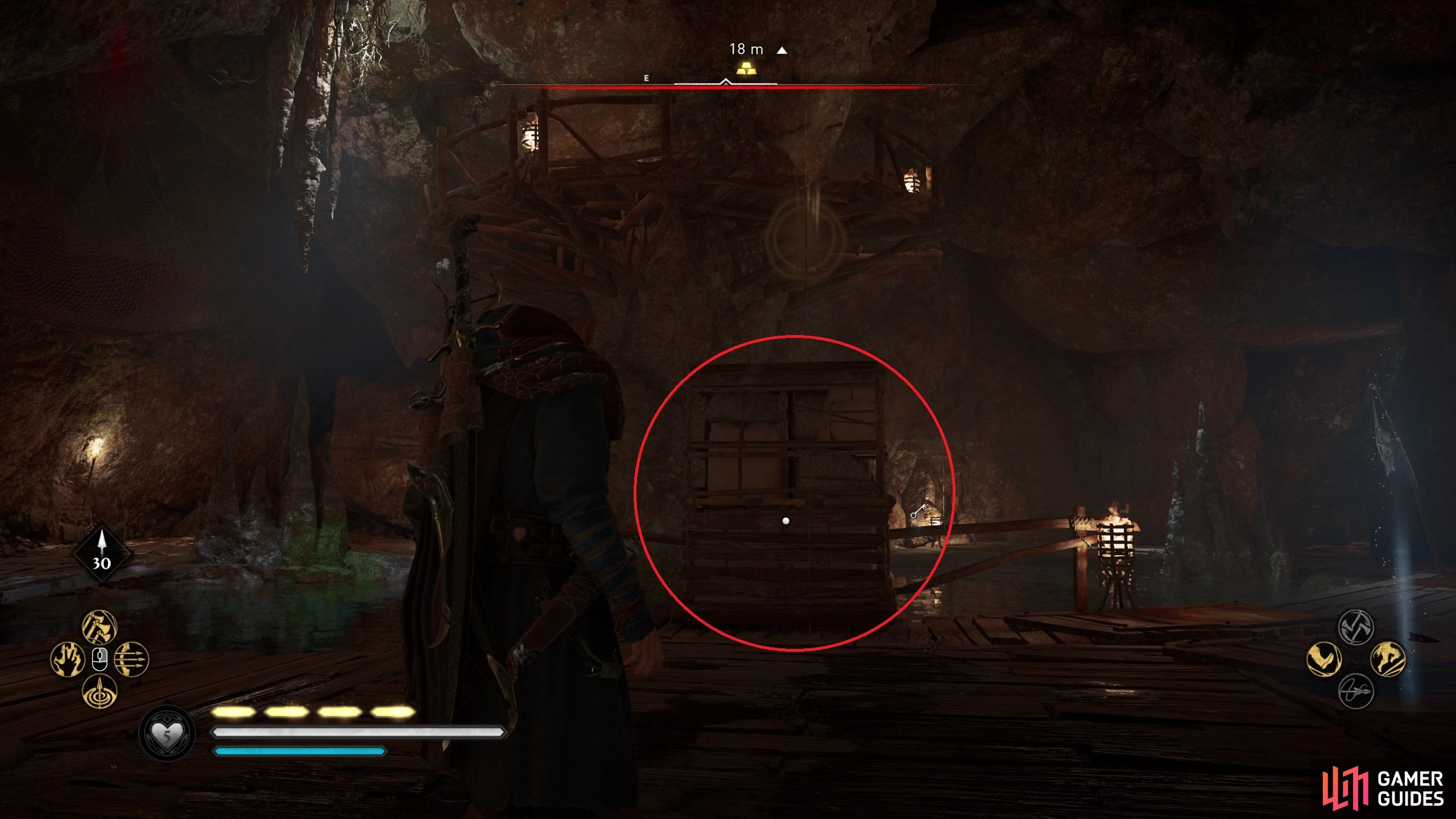 You'll find a movable barricade on the western side of the chamber. Use it to reach the wooden platform.
