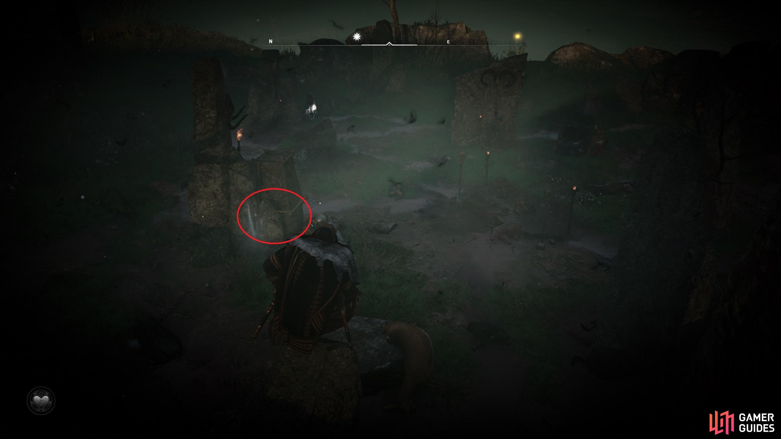 Move the stone to reveal the cursed symbol.