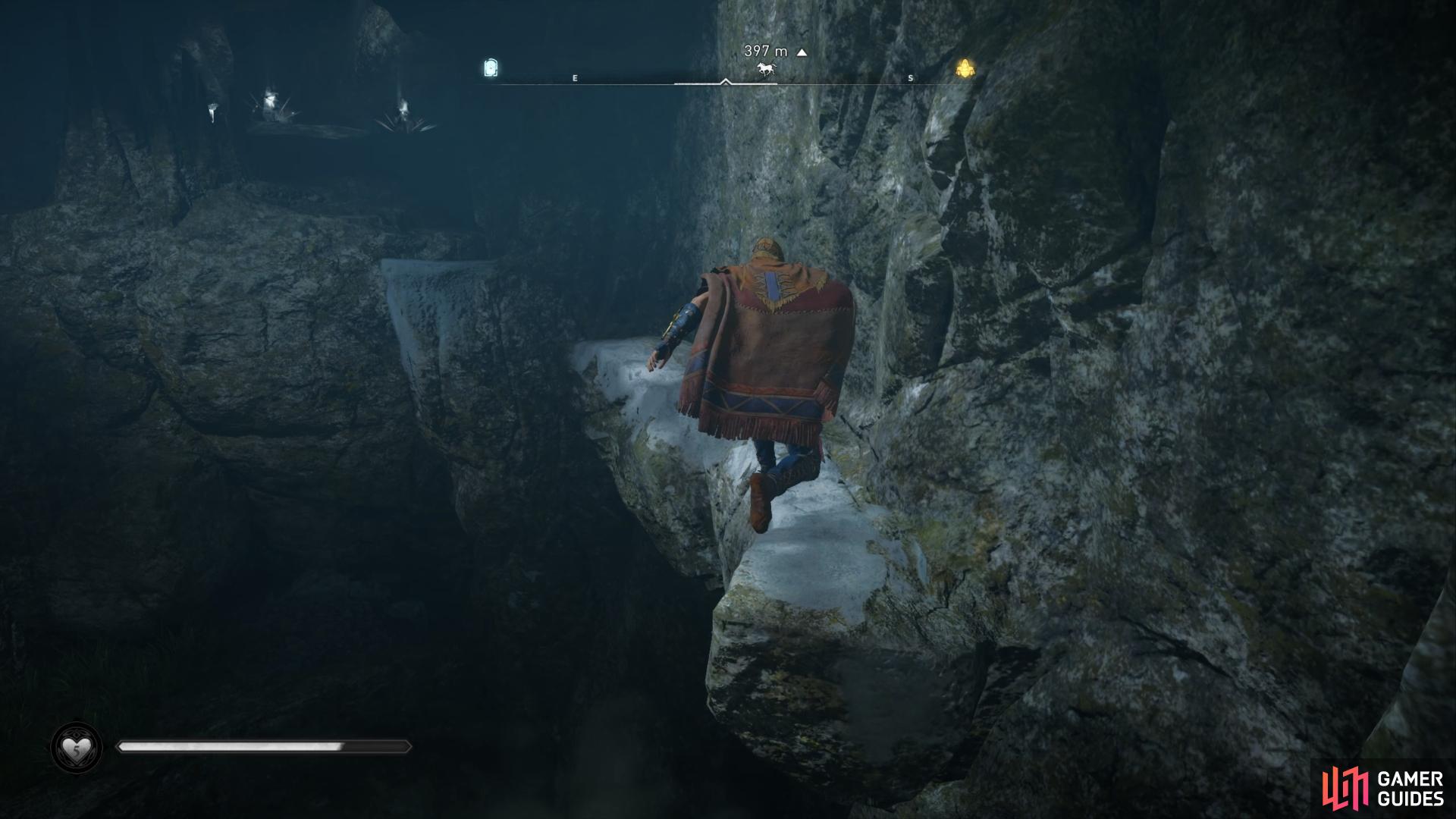 Once inside the cave system, follow the ledges through the chambers.