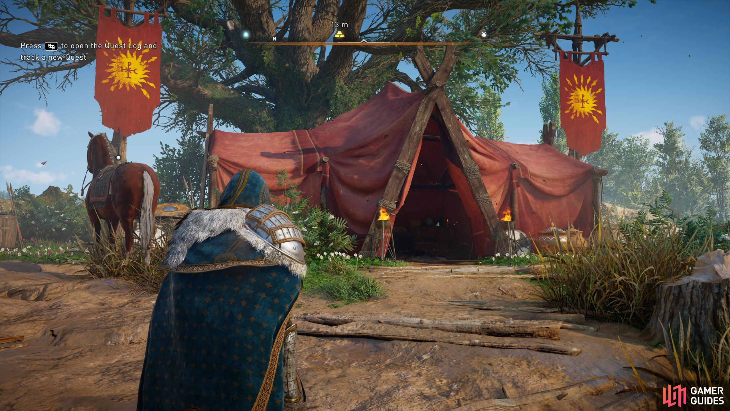 The chest is located in the large red tent with two banners either side of it.
