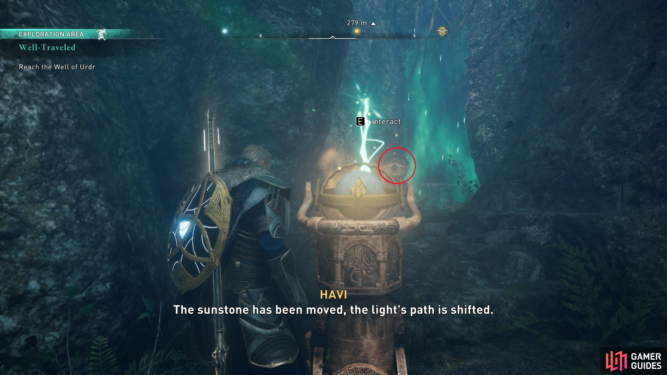 You'll need to align the beam of light with the mechanism directly in front of you to proceed through the cave.