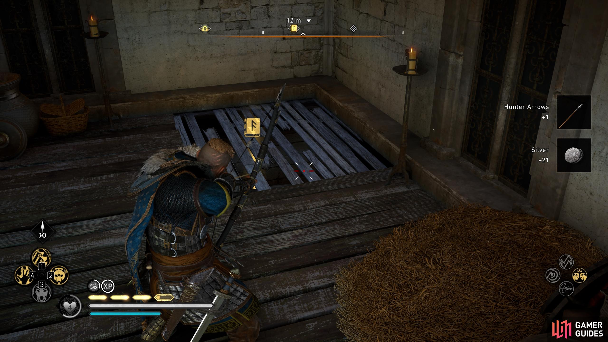 Once inside the tower, shoot the wooden barrier on the floor to enter a hidden room.