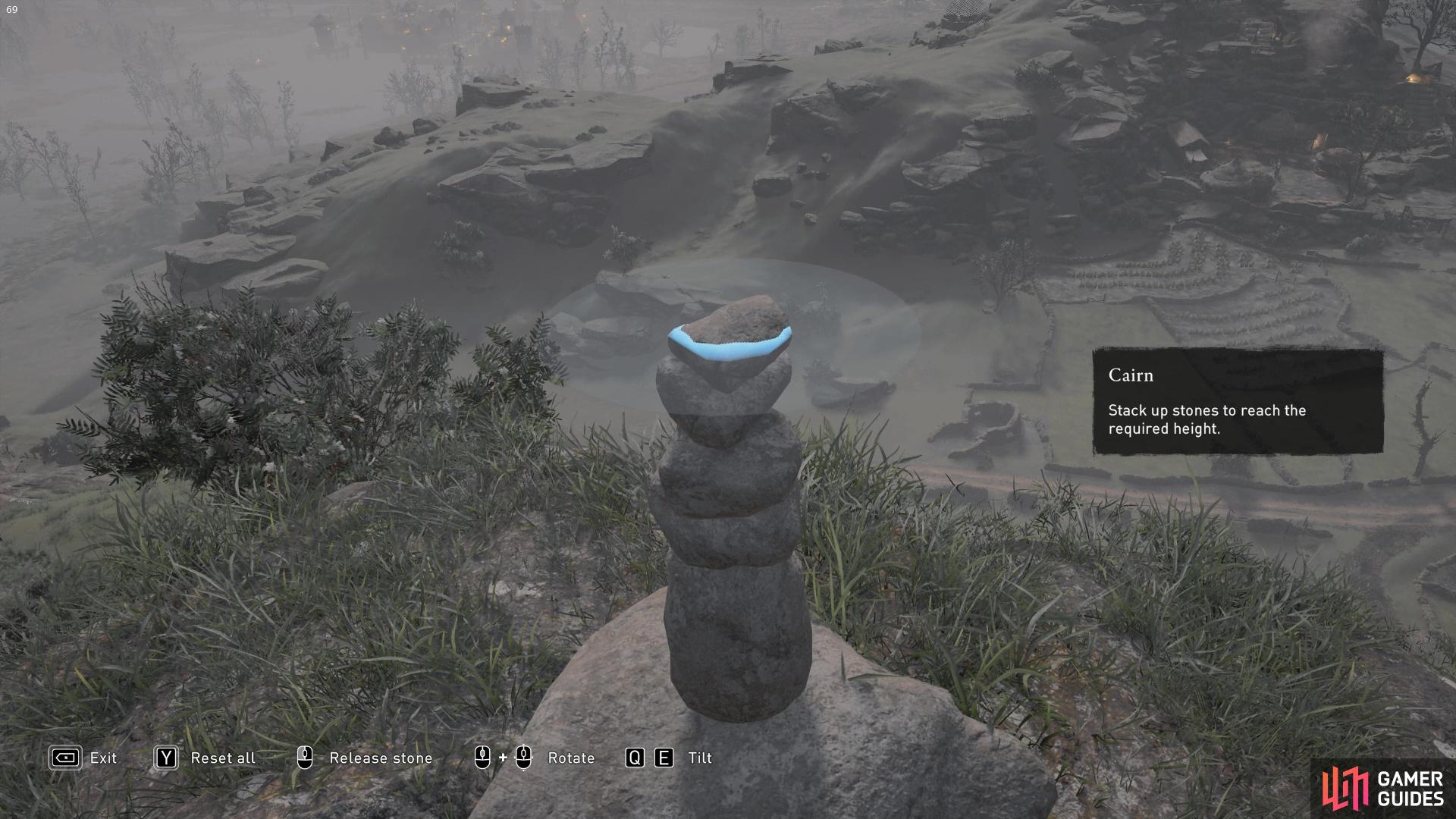 Finally, place the smallest rock on top and then hold to validate!
