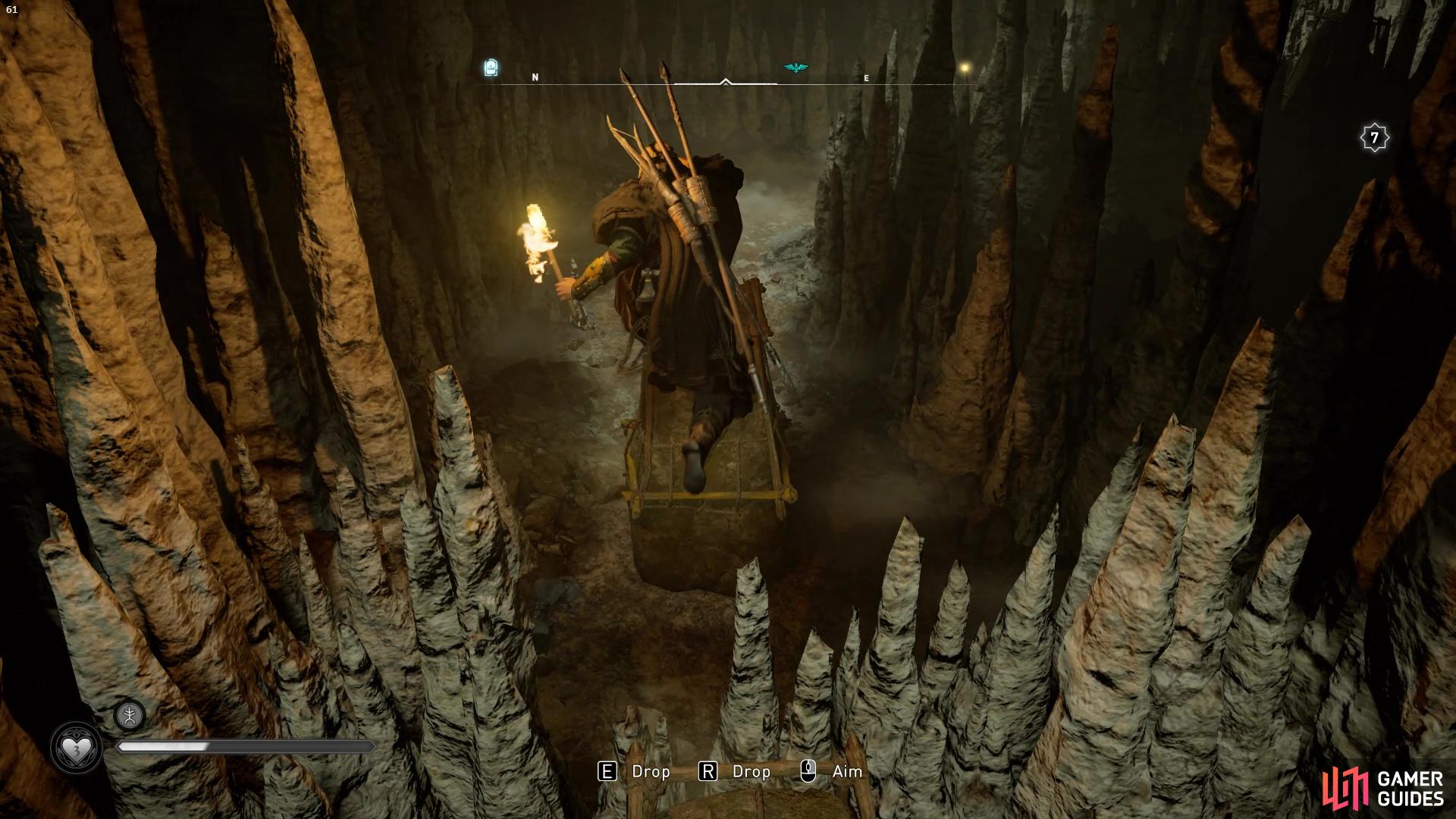 Youll need to use the moveable rock objects to jump over the stalagmite barricades
