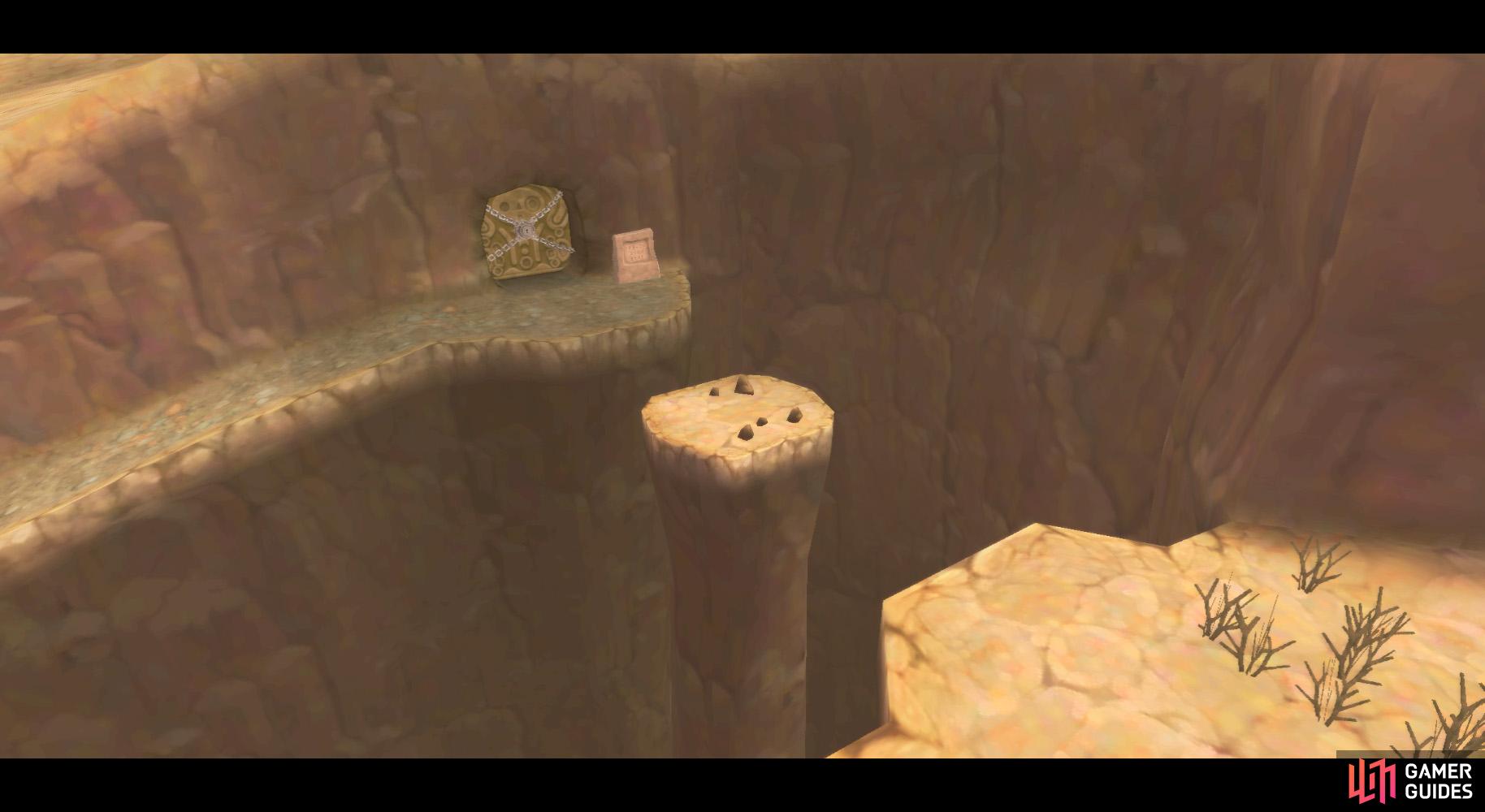 Use your Hook Beetle to snag a Bomb atop a Cactus, then launch it towards this platform to clear the boulder.
