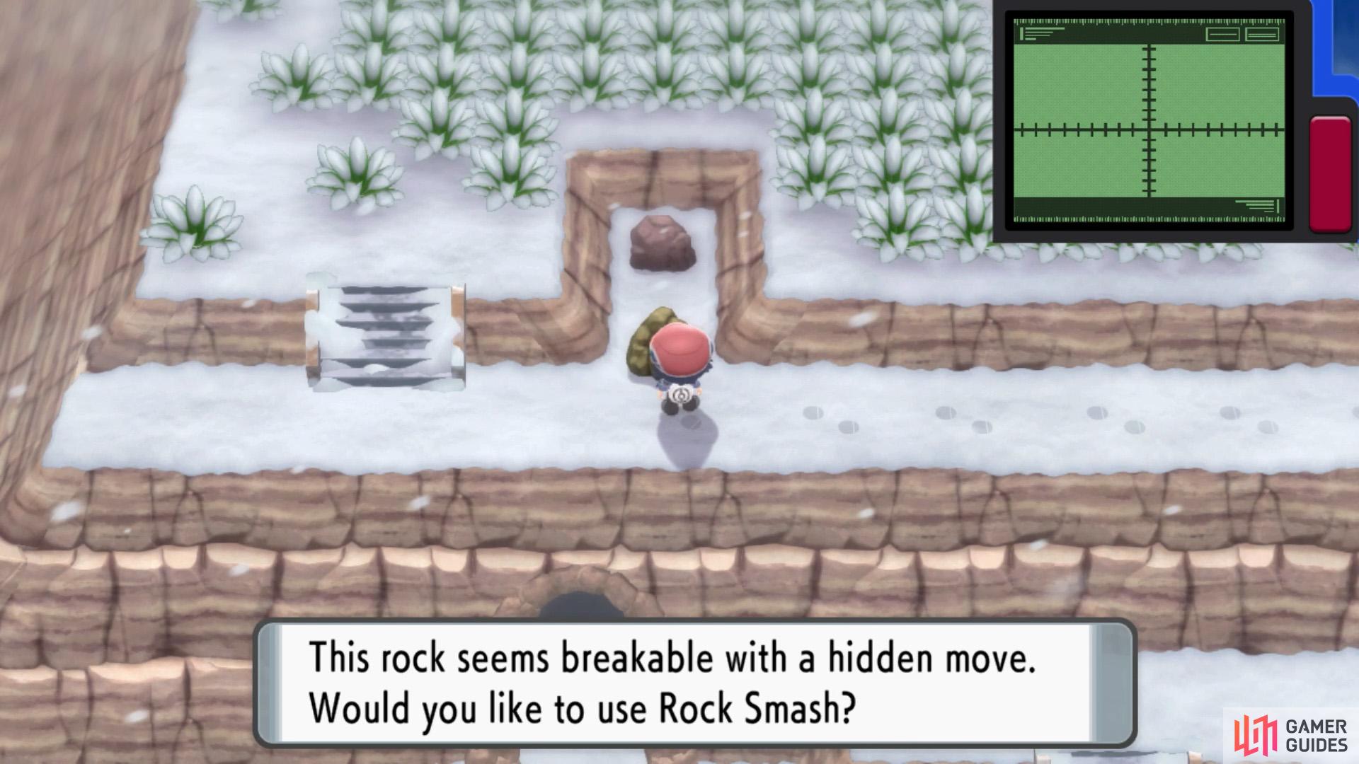 Further west, there's a suspicious rock behind a cracked rock…