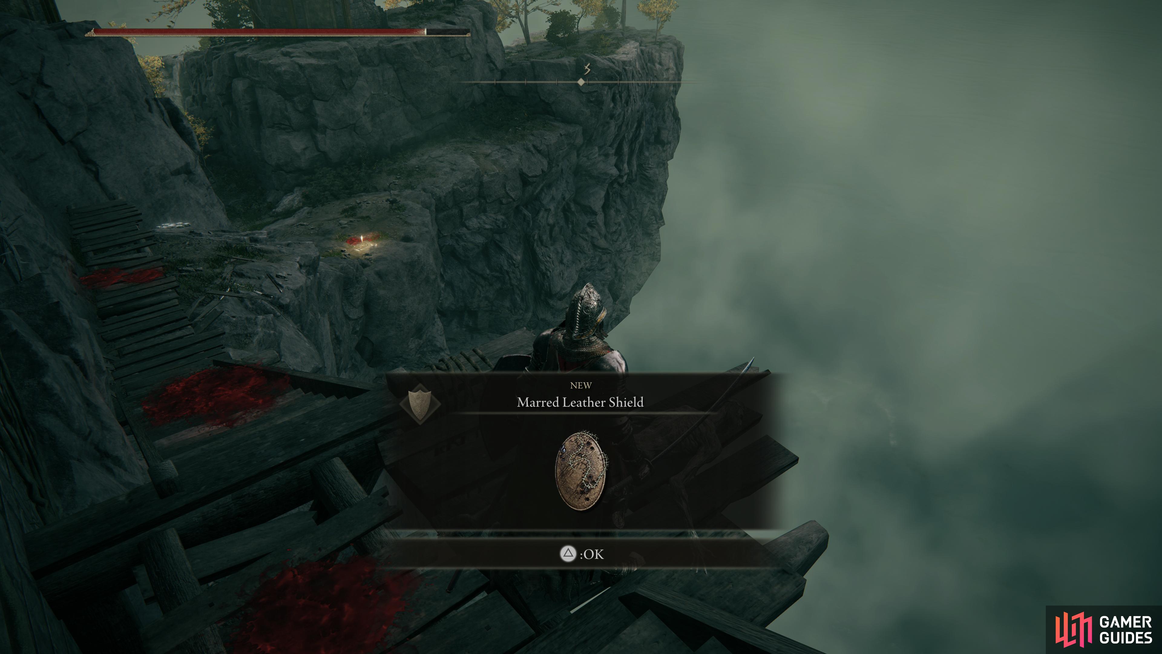 Loot a corpse near the Stormveil Castle Site of Grace to find the Marred Leather Shield.