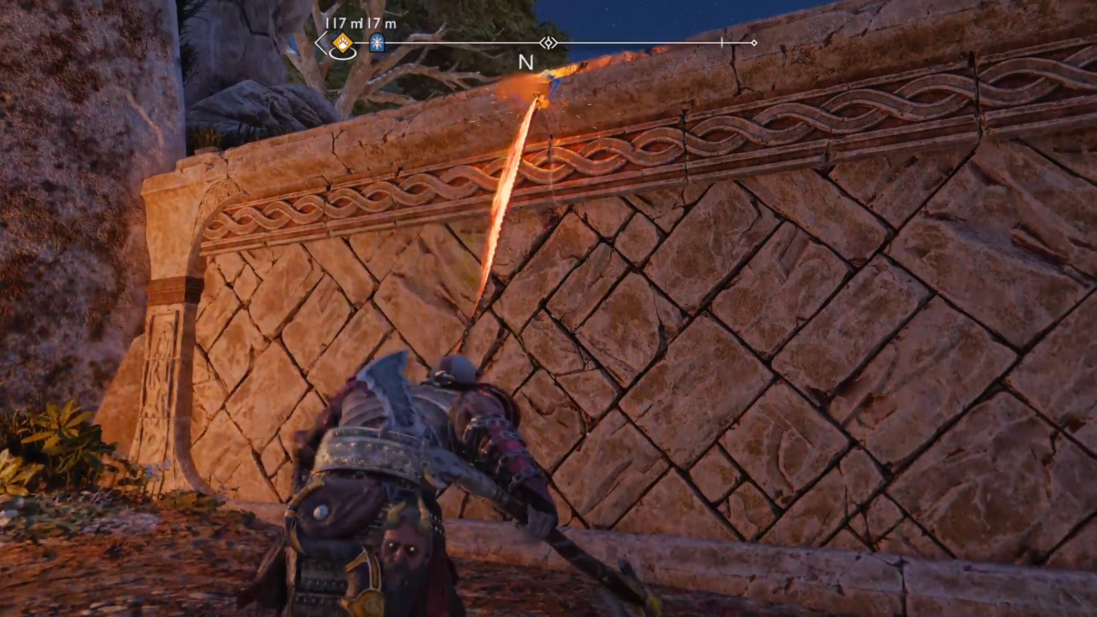 Grapple up to this ledge after passing through the archway