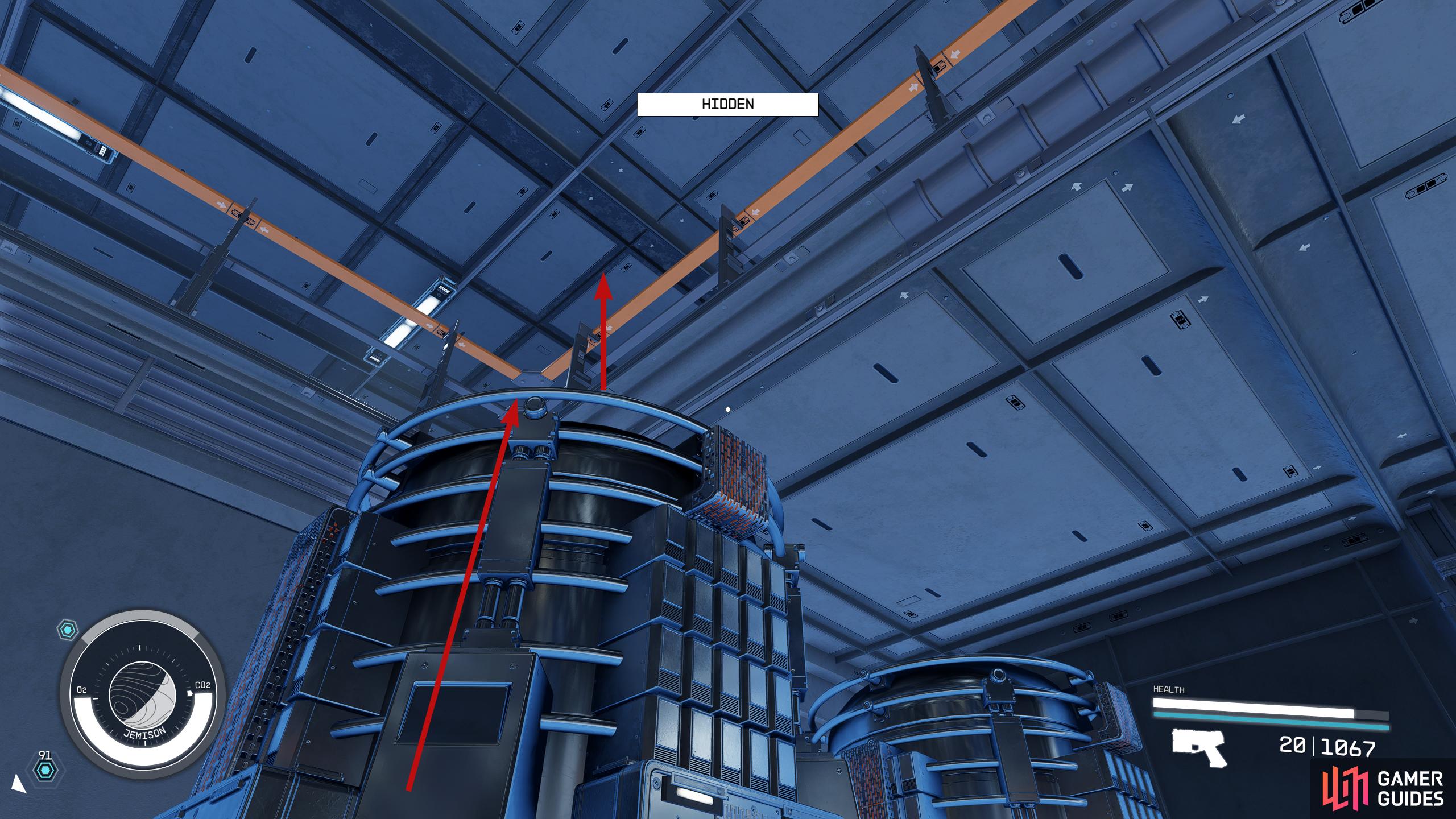 Climb the nearby machine and climb over the railing.