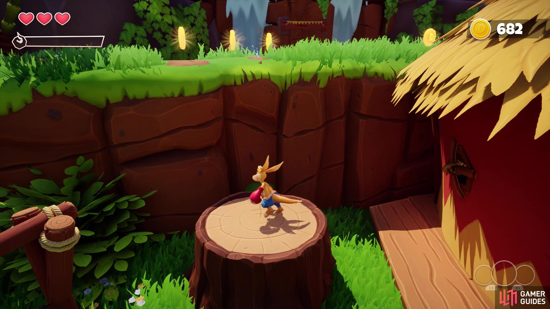 Double jump and tail spin to reach the ledge above this stump