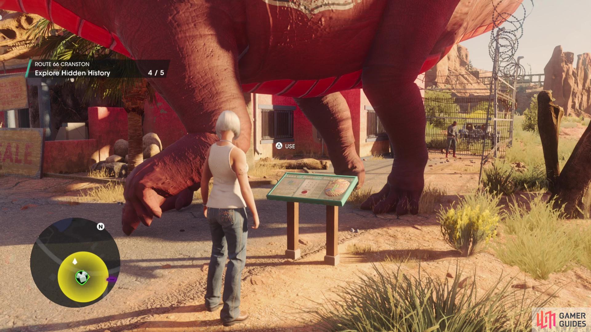the third sign can be found in front of a red sauropod near the "Kavanagh County Rock Shop",