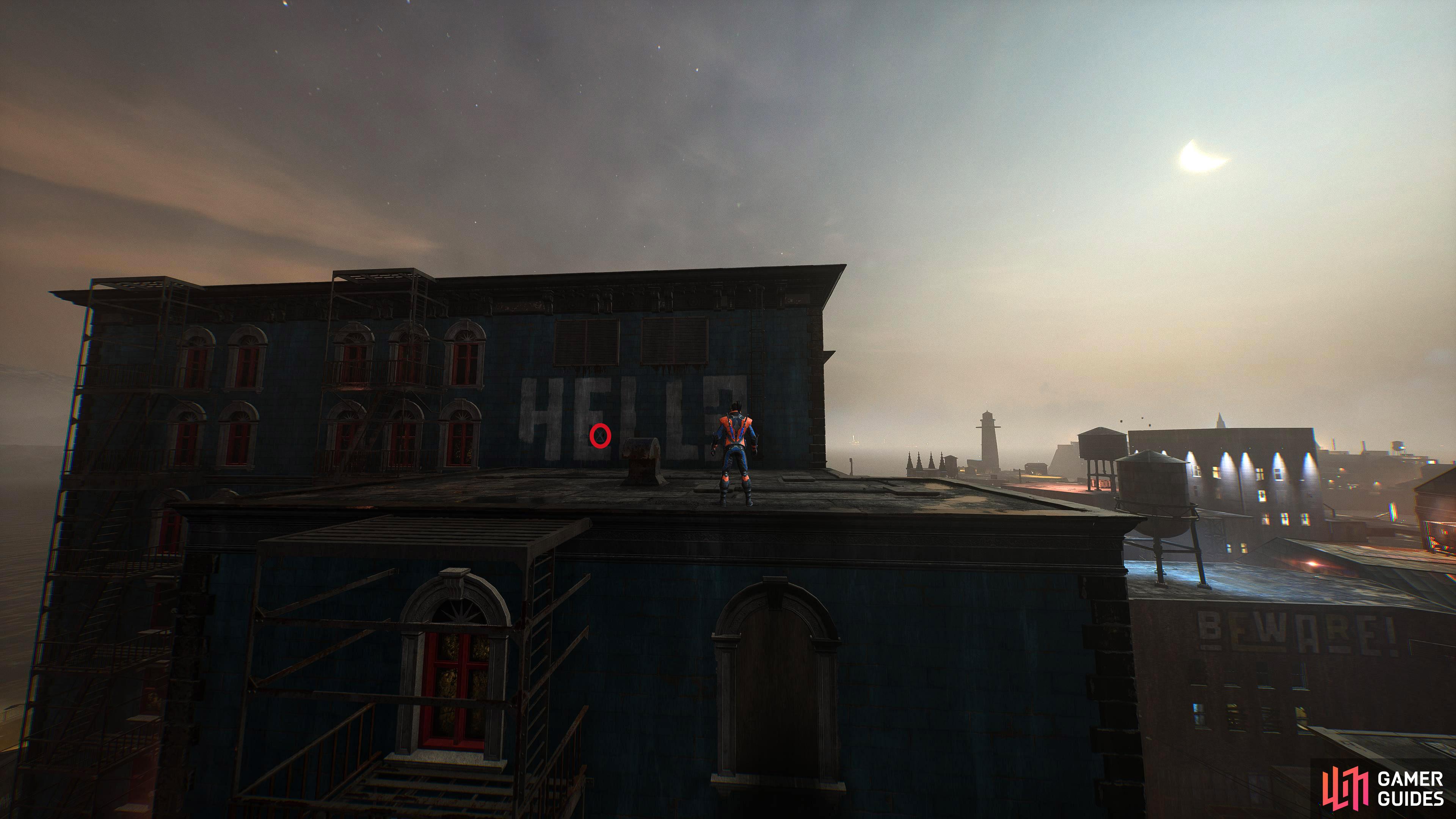 On an upper roof in the complex north of Monarch Theater. Look for the white “Help” graffiti.