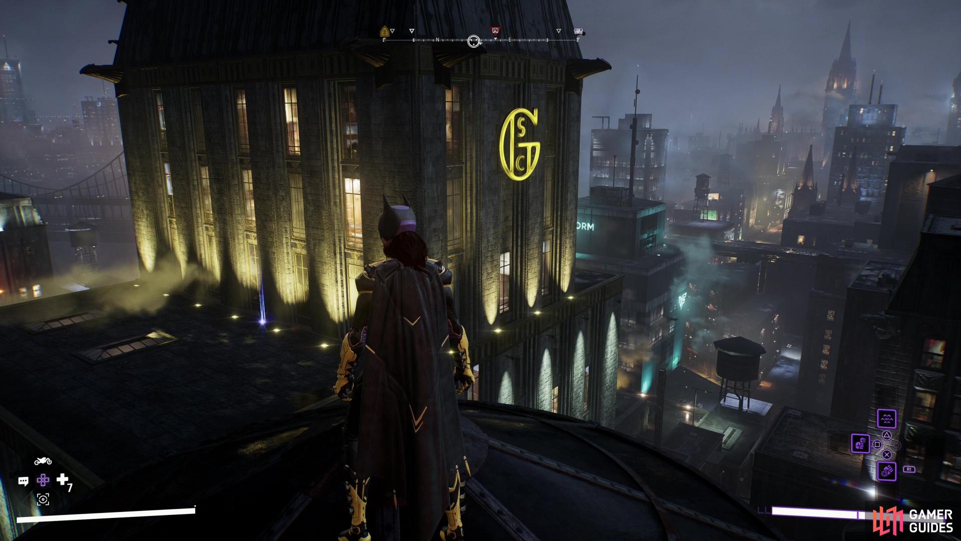Search near the top of the unmarked Gotham City Shopping Center to find a Batarang.