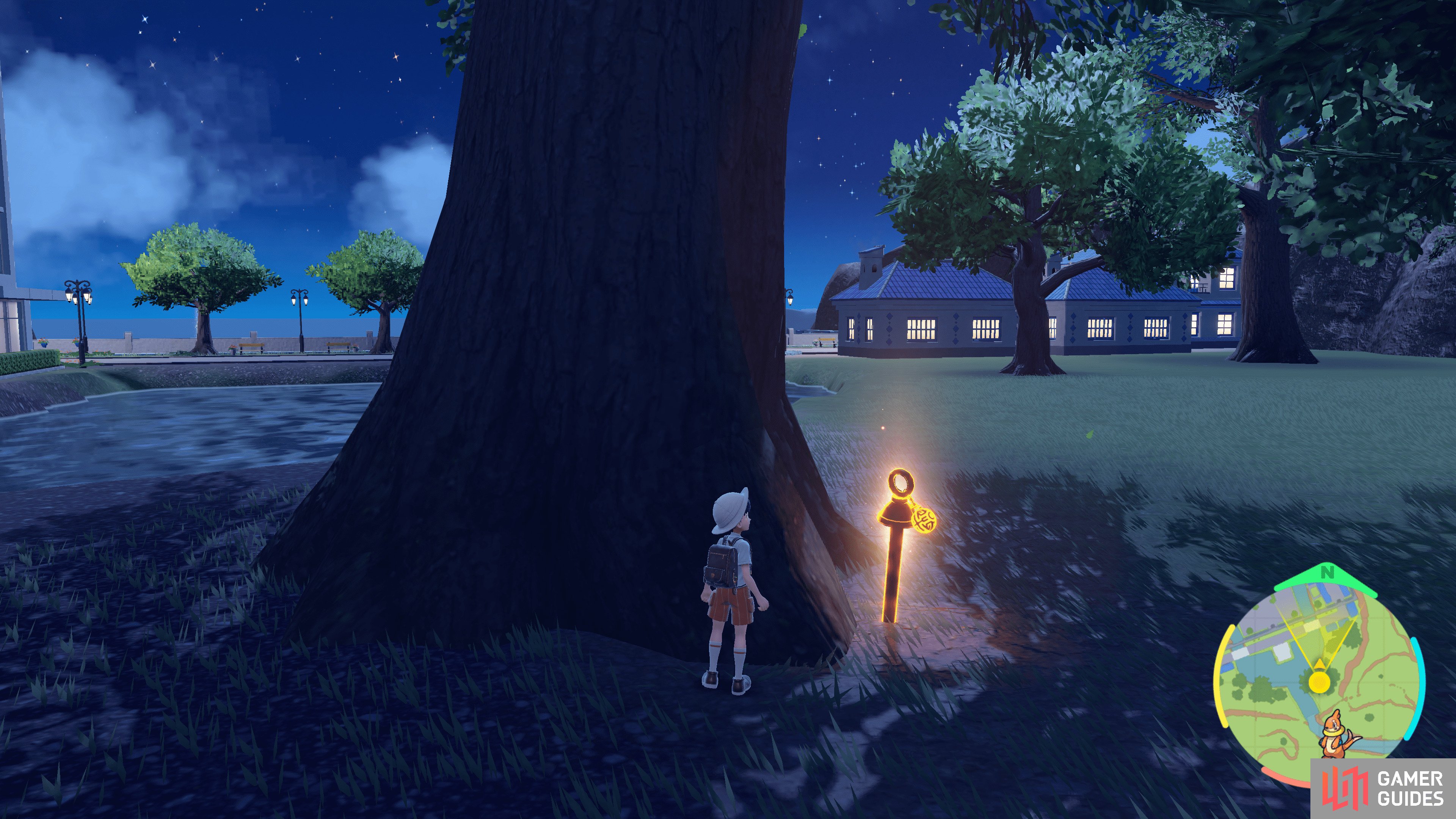 the final orange stake can be found south of the town by a tree.