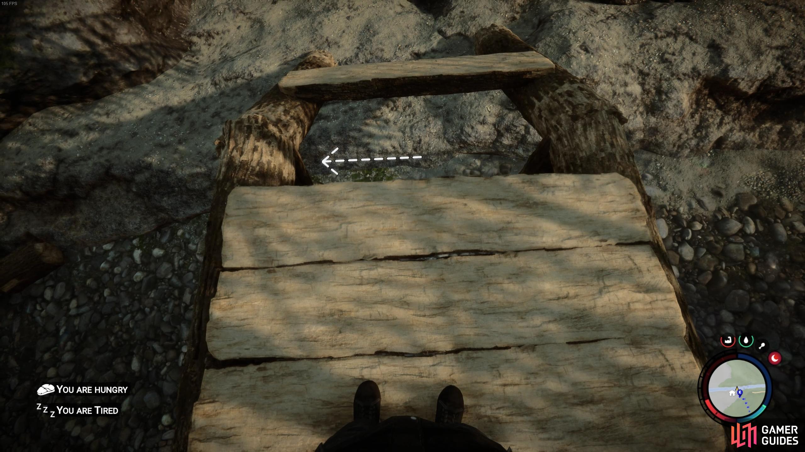 You can place the split logs along the bridge structure to create flooring.